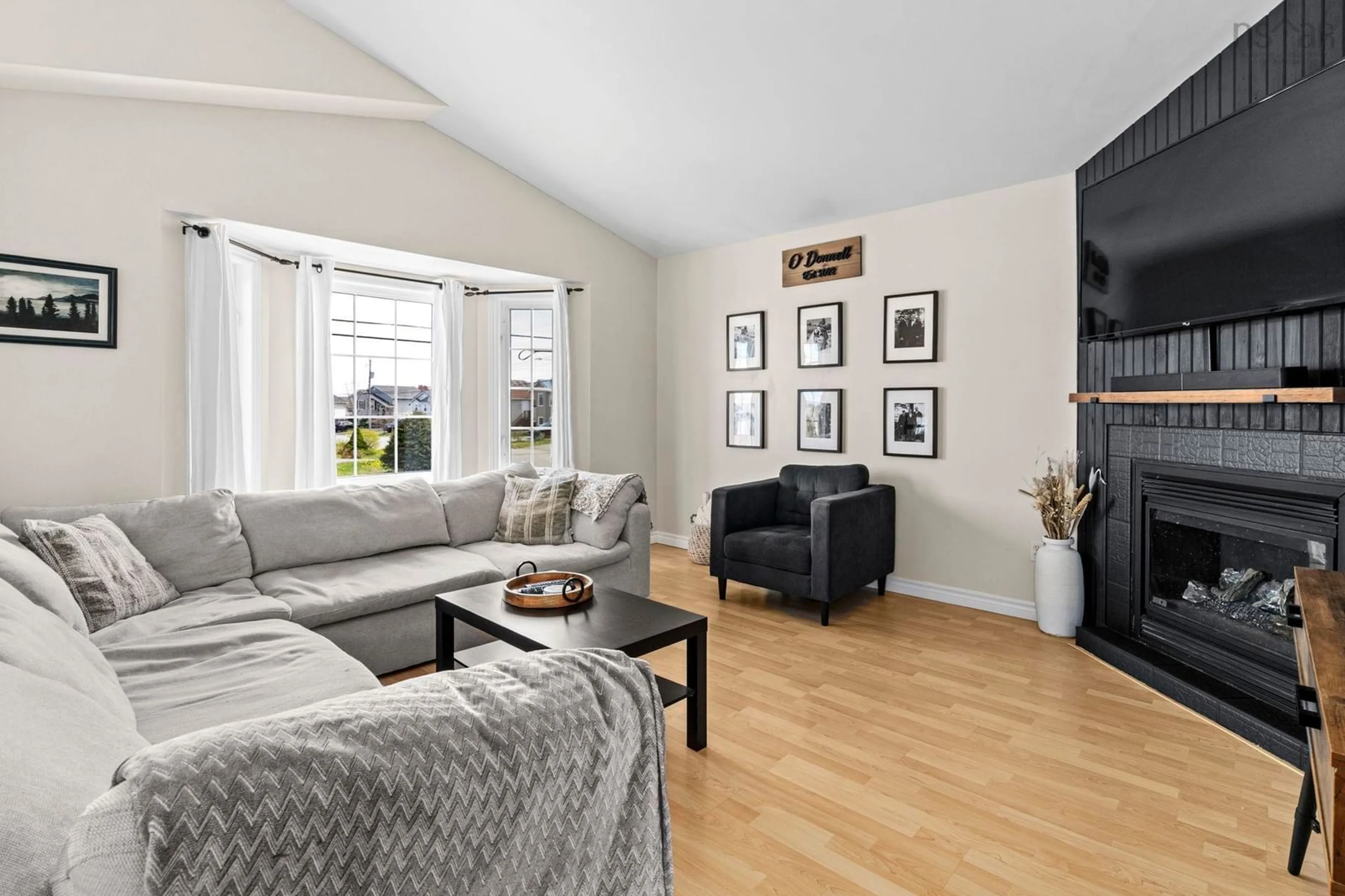 Living room with furniture, wood/laminate floor for 151 Jeep Cres, Eastern Passage Nova Scotia B3G 1R2
