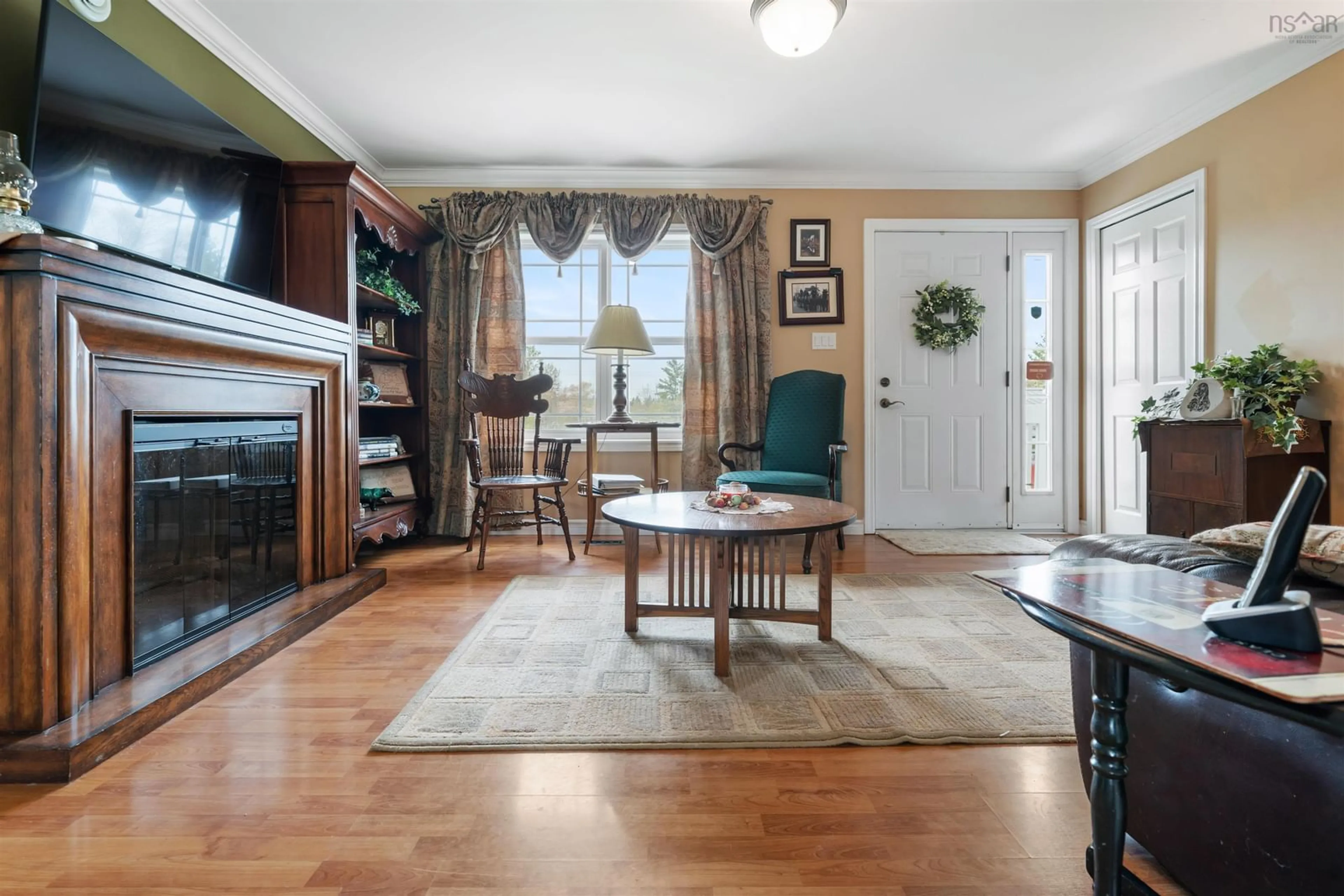 Living room with furniture, wood/laminate floor for 11 Grono Rd, Dutch Settlement Nova Scotia B2S 2H2