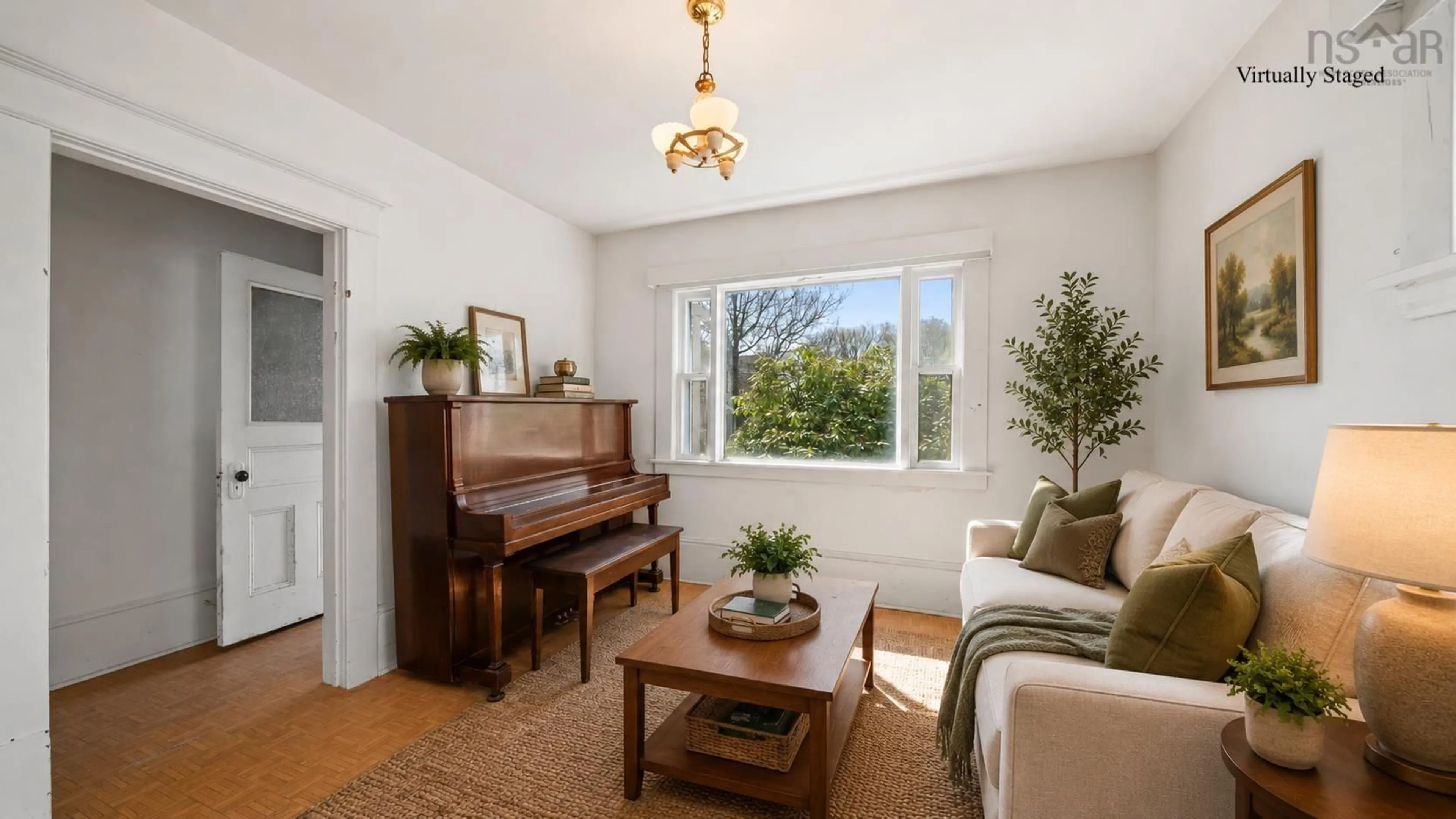 Living room with furniture, wood/laminate floor for 6949 Chebucto Rd, Halifax Nova Scotia B3L 1M6