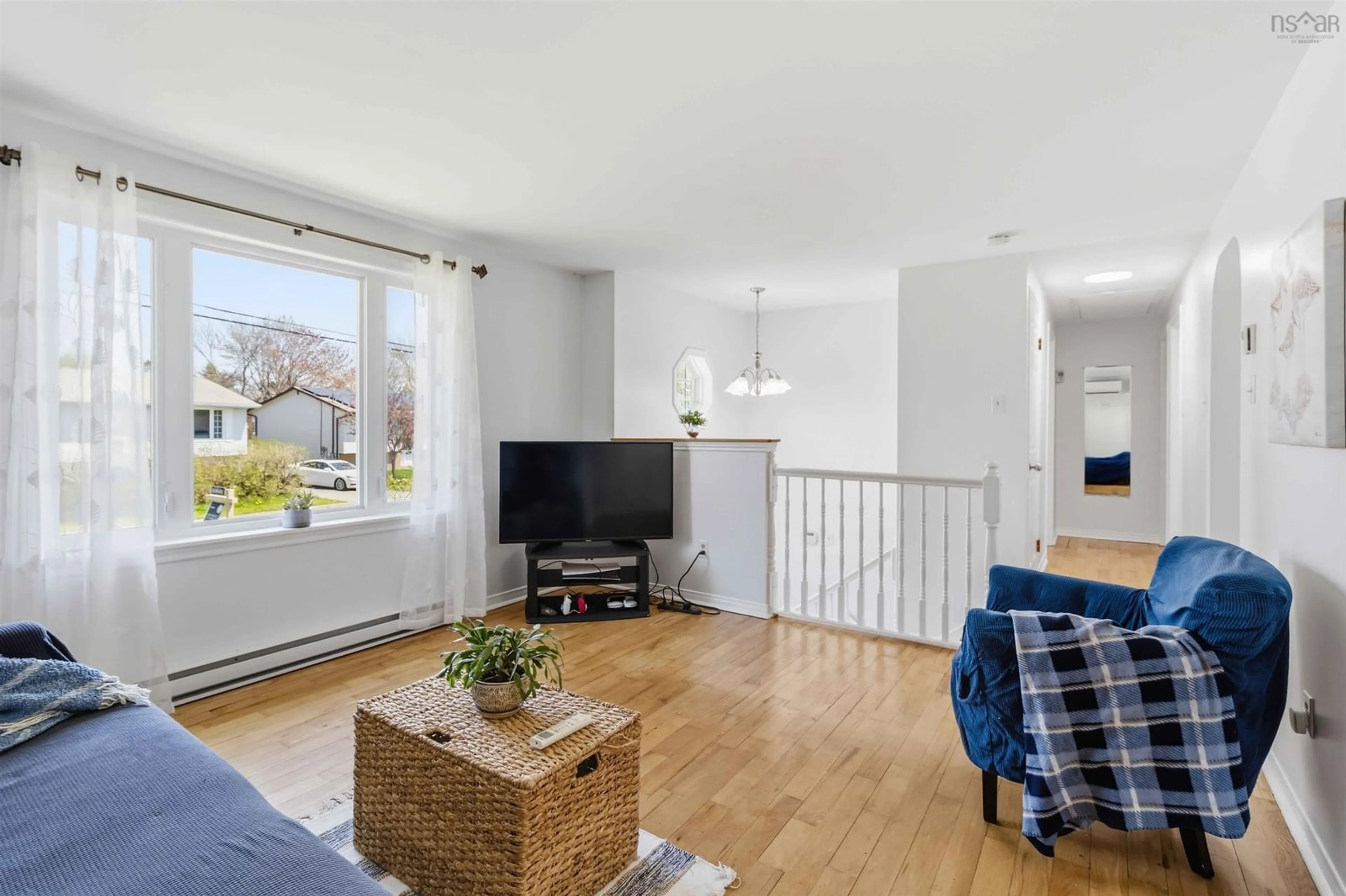Living room with furniture, wood/laminate floor for 17 Silistria Dr, Cole Harbour Nova Scotia B2W 5Y1
