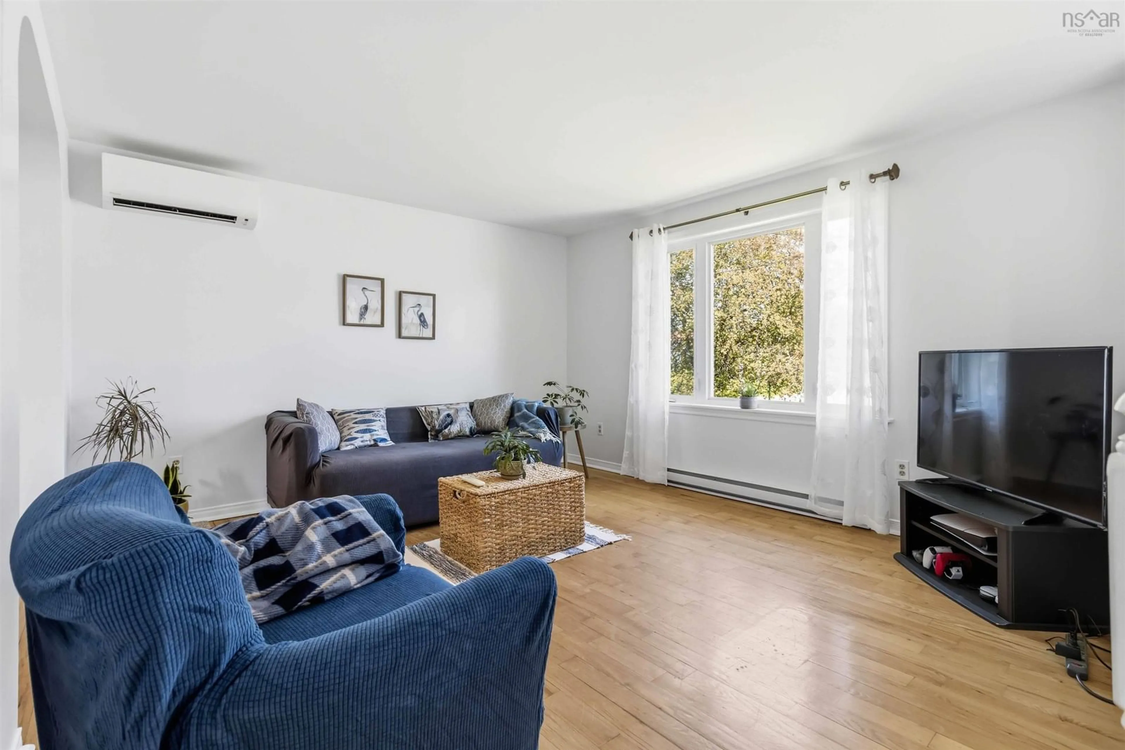 Living room with furniture, wood/laminate floor for 17 Silistria Dr, Cole Harbour Nova Scotia B2W 5Y1