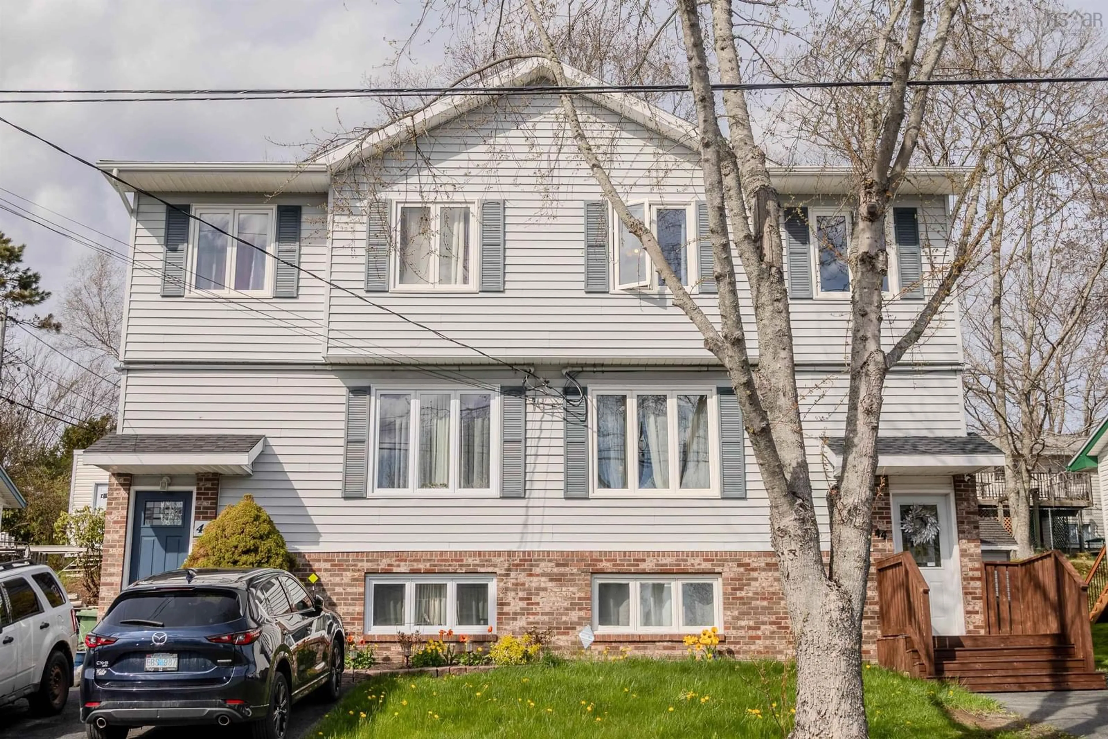 Home with vinyl exterior material, street for 44 Florence Place Court, Lower Sackville Nova Scotia B4C 3Z4