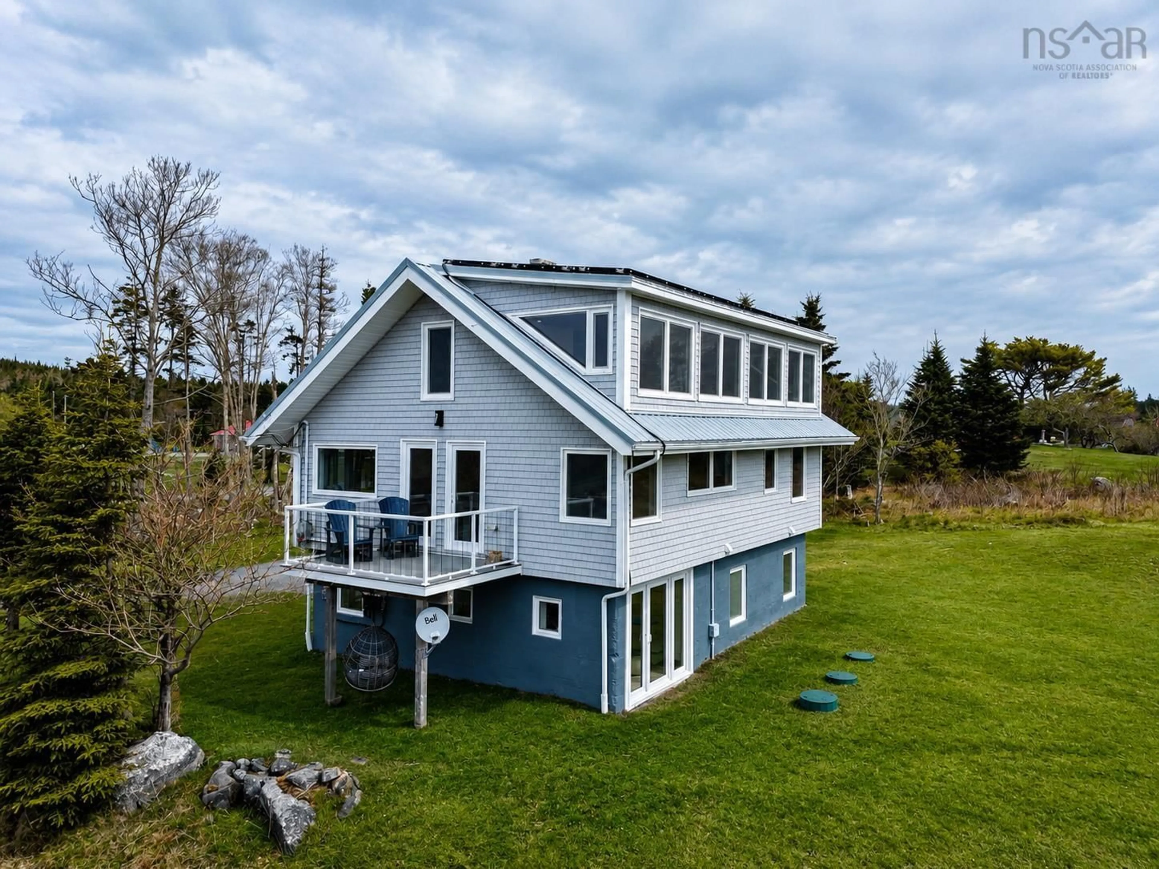 A pic from outside/outdoor area/front of a property/back of a property/a pic from drone, water/lake/river/ocean view for hwy 7 Oyster Pond #10380, Oyster Pond Nova Scotia B0J 2L0