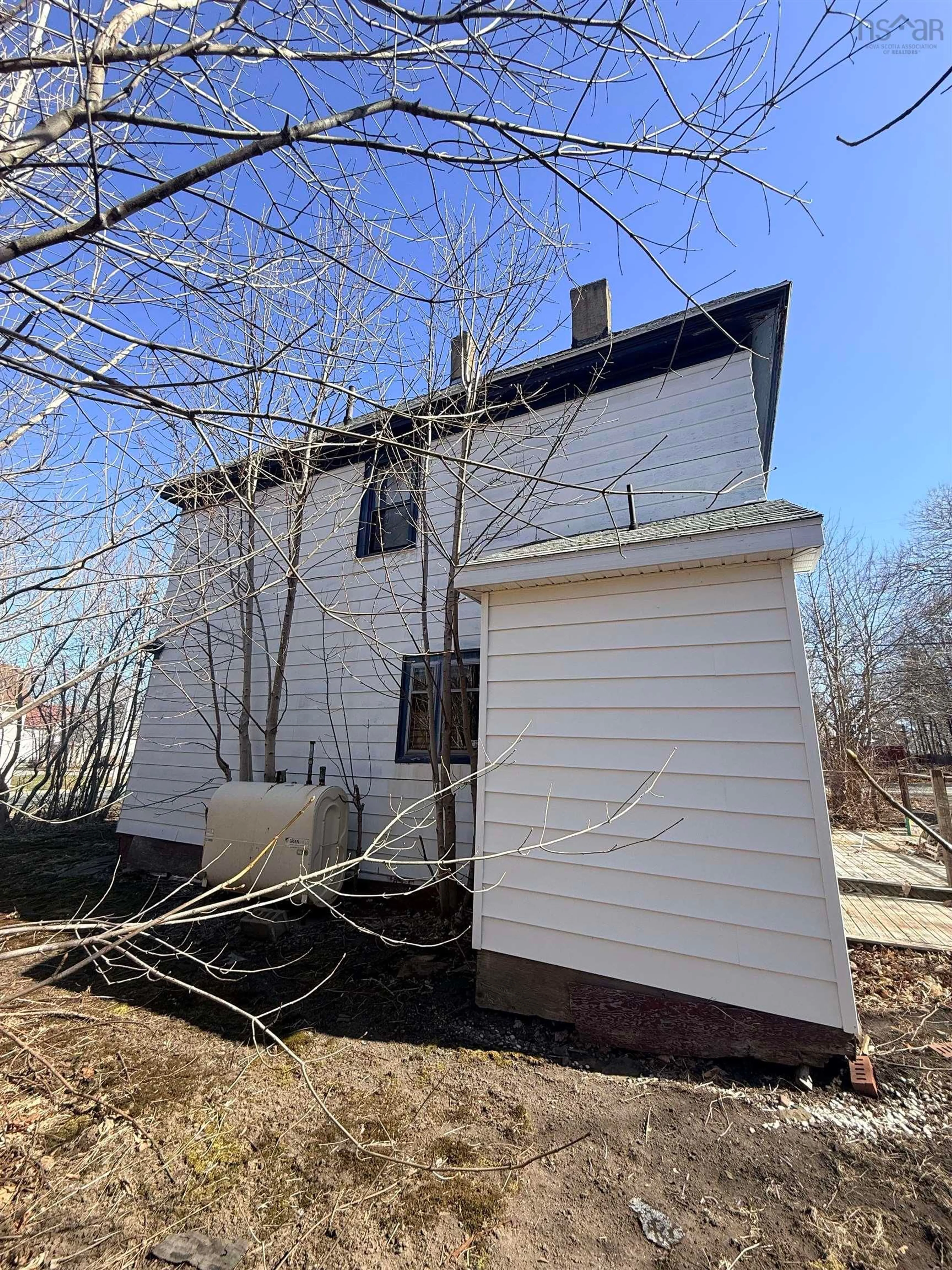 Home with vinyl exterior material, street for 25 Queen St, Sydney Mines Nova Scotia B1V 1L2