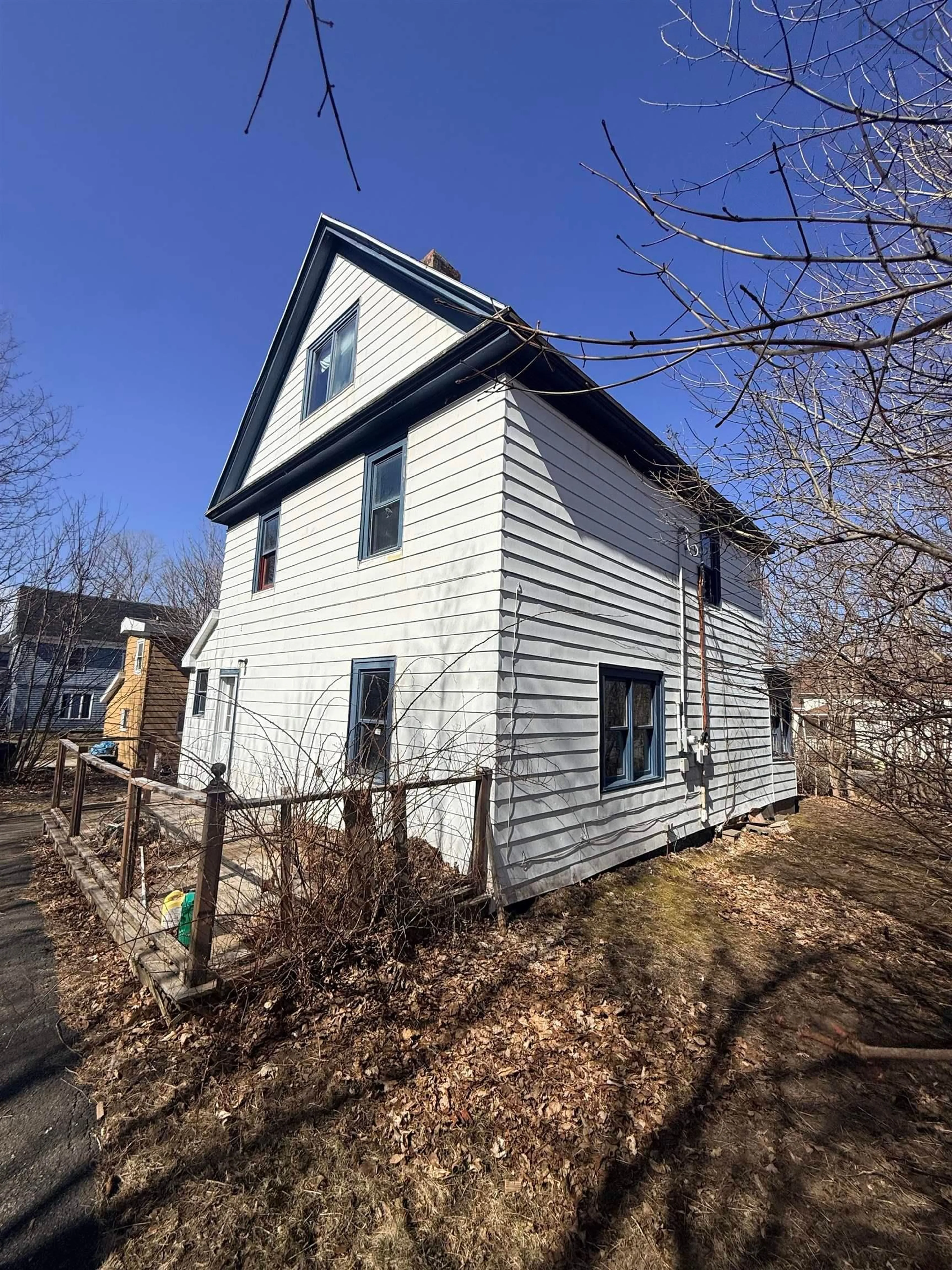 Home with vinyl exterior material, street for 25 Queen St, Sydney Mines Nova Scotia B1V 1L2