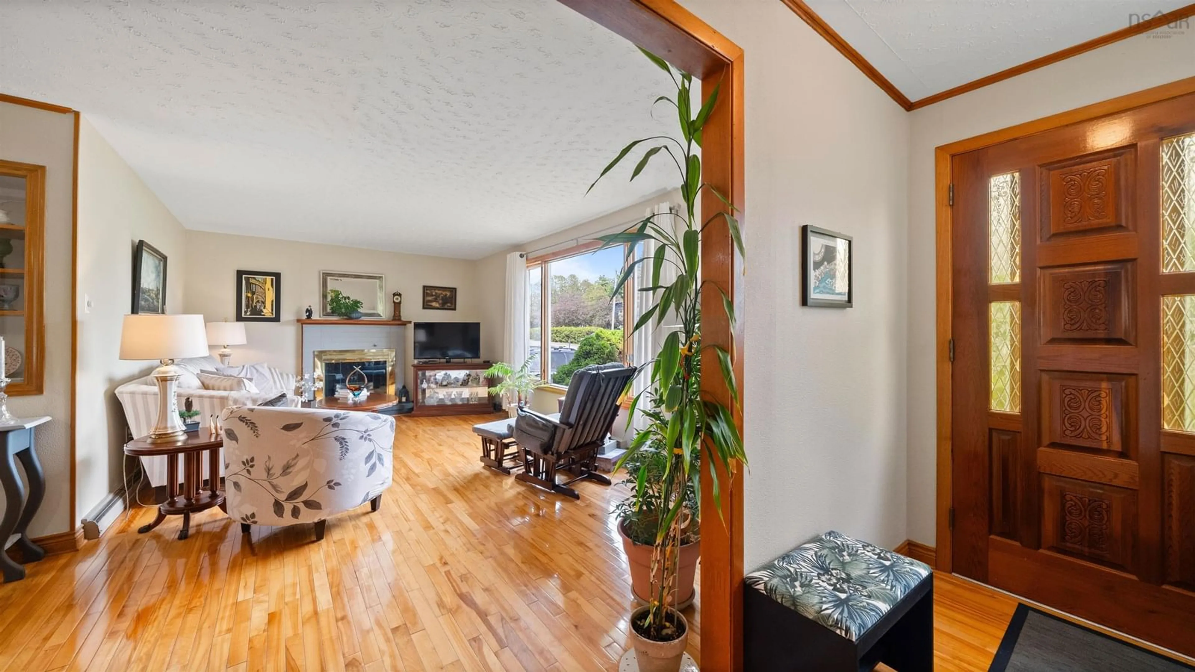 Living room with furniture, wood/laminate floor for 1134 Aalders Ave, New Minas Nova Scotia B4N 3H5