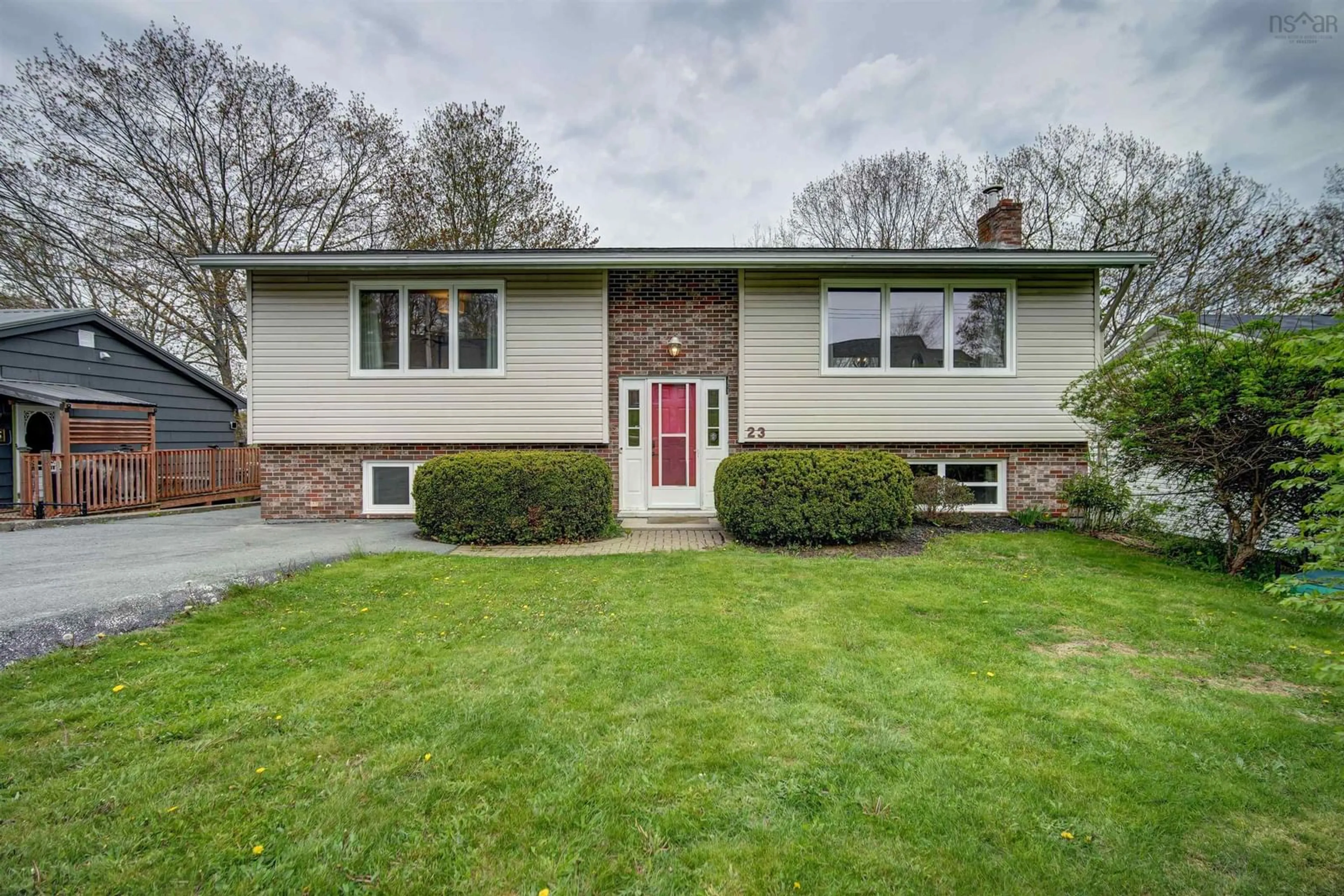 Home with vinyl exterior material, street for 23 Meadowview Dr, Bedford Nova Scotia B4A 2C3