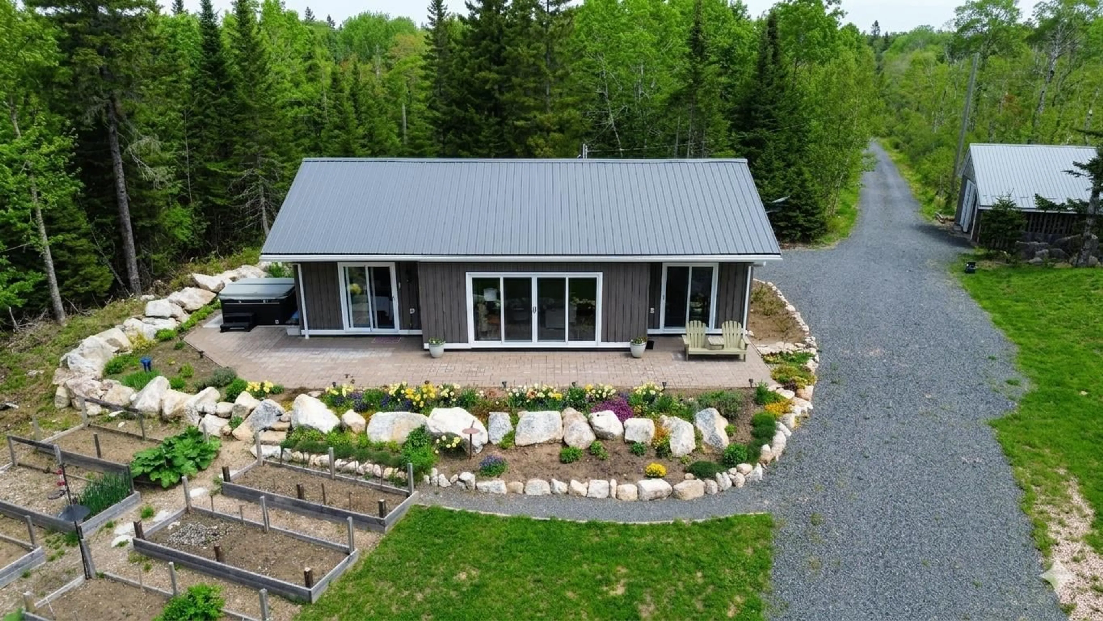 A pic from outside/outdoor area/front of a property/back of a property/a pic from drone, building for 8 Alexander Ave, Waterloo Lake Nova Scotia B0S 1P0