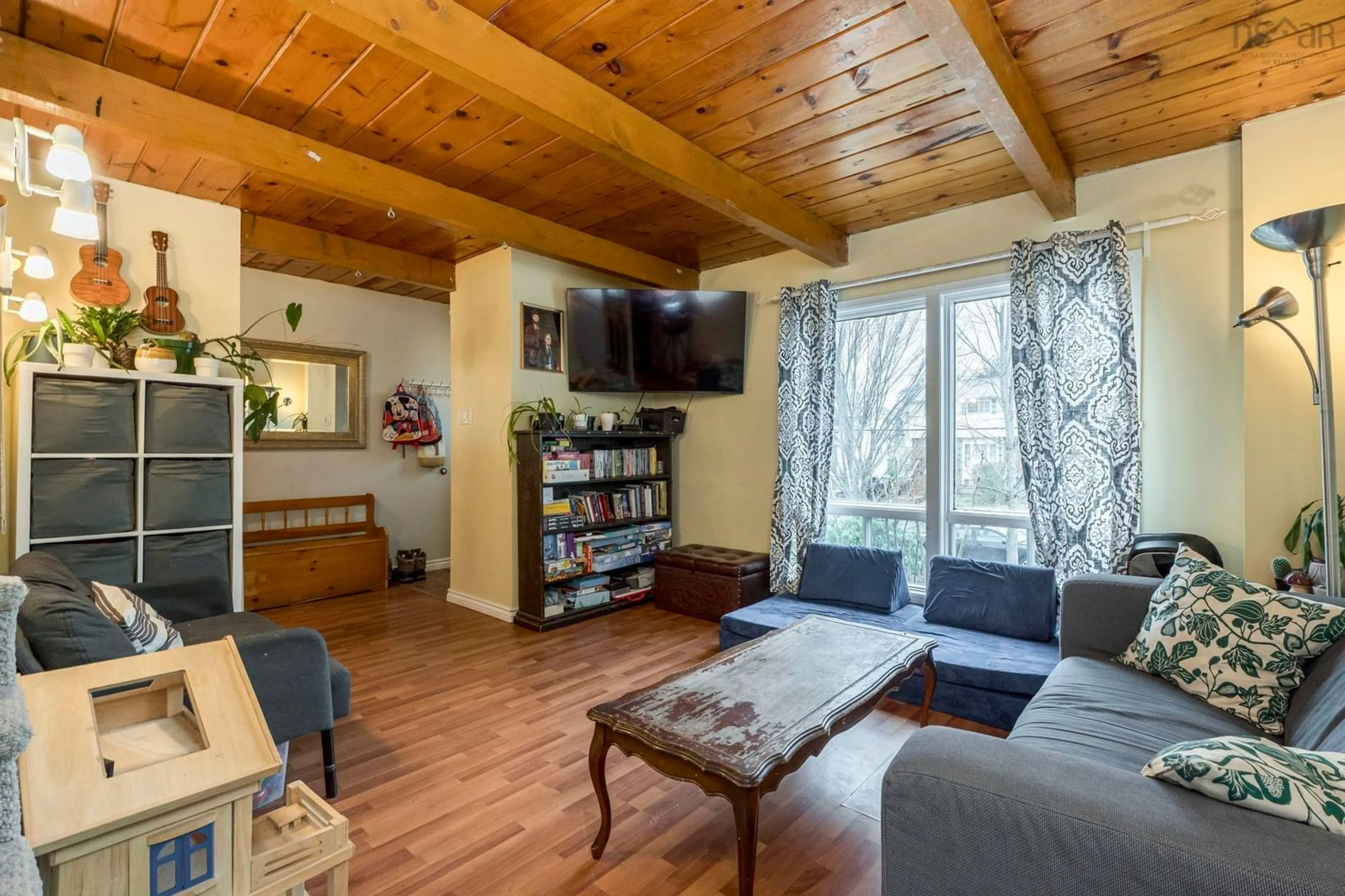 Living room with furniture, wood/laminate floor for 541 Arklow Dr, Dartmouth Nova Scotia B2W 4Z5
