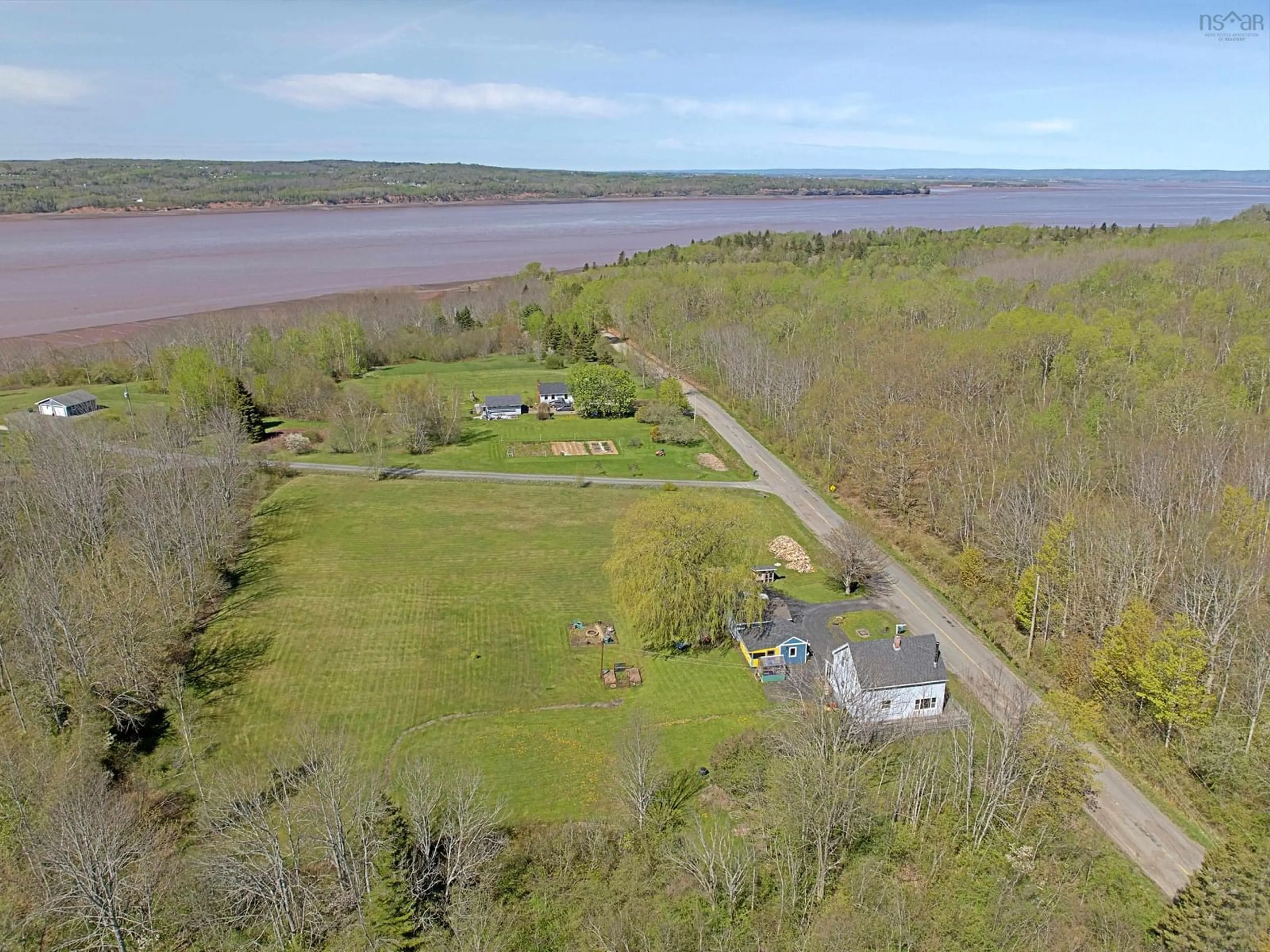 A pic from outside/outdoor area/front of a property/back of a property/a pic from drone, water/lake/river/ocean view for 51 Block Wharf Rd, Summerville Nova Scotia B0N 2K0