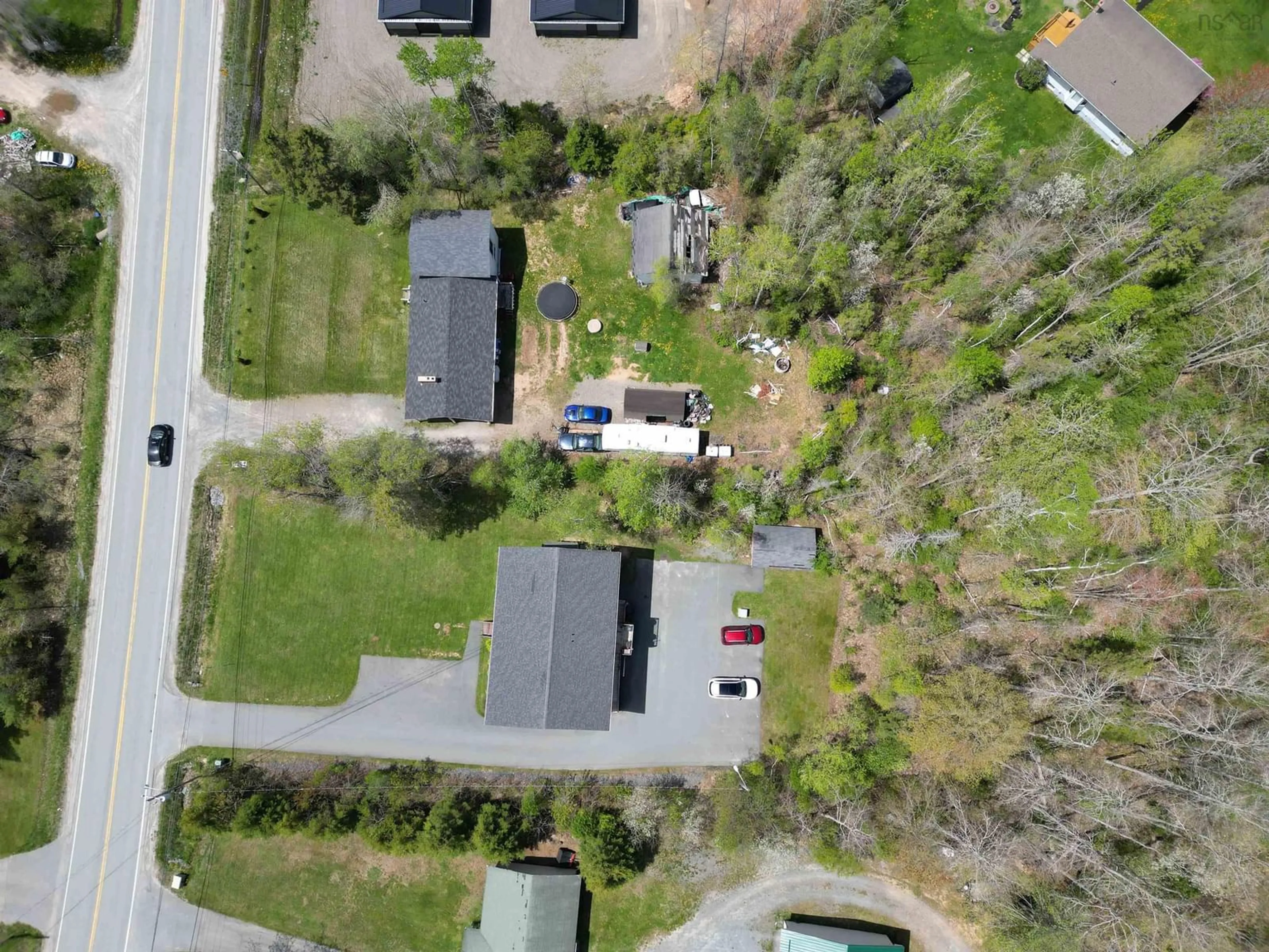 A pic from outside/outdoor area/front of a property/back of a property/a pic from drone, street for 1463 Highway 214, Nine Mile River Nova Scotia B2S 2R4