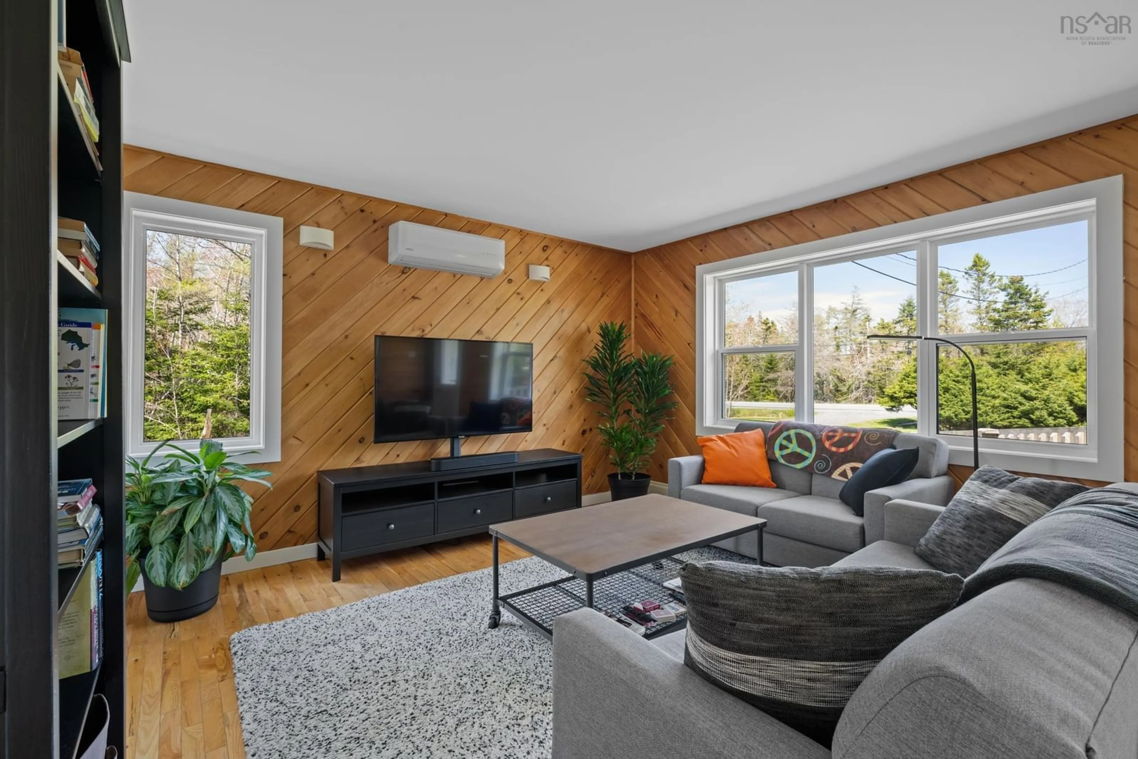 Living room with furniture, wood/laminate floor for 1170 West Jeddore Rd, West Jeddore Nova Scotia B0J 1P0