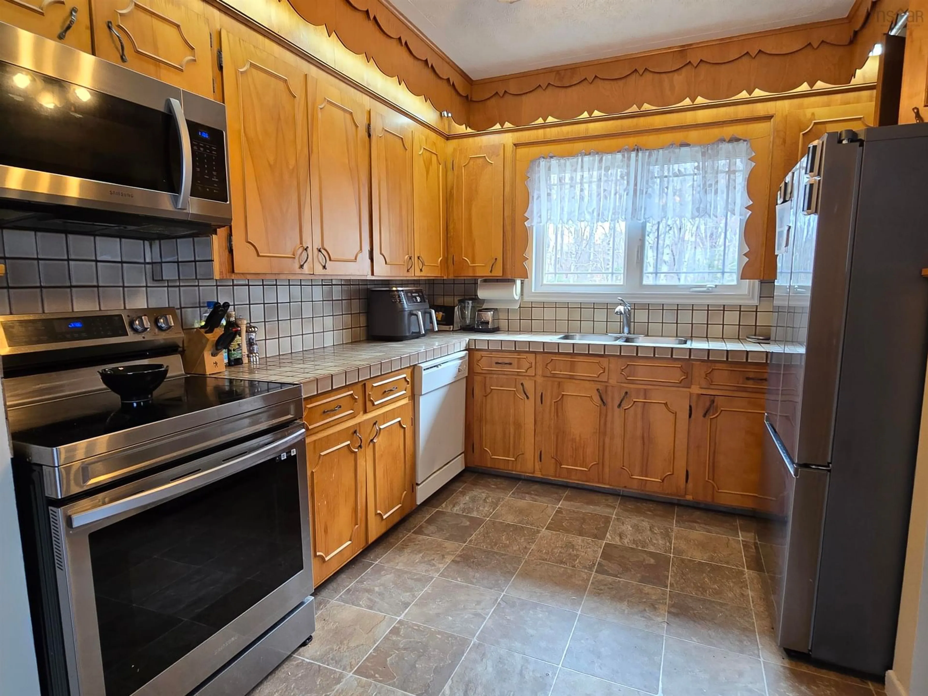 Standard kitchen, ceramic/tile floor for 36 Ranna Dr, Sydney Nova Scotia B1P 3Y7