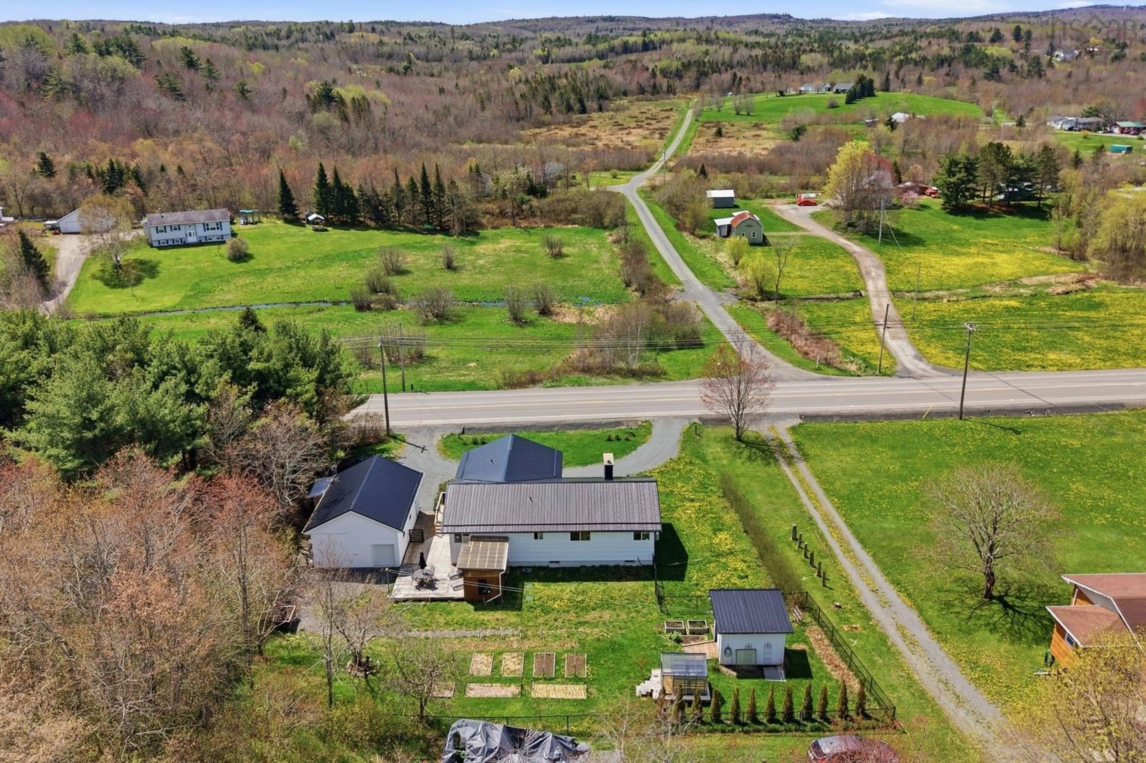 A pic from outside/outdoor area/front of a property/back of a property/a pic from drone, unknown for 4885 Highway 1, Three Mile Plains Nova Scotia B0N 2T0