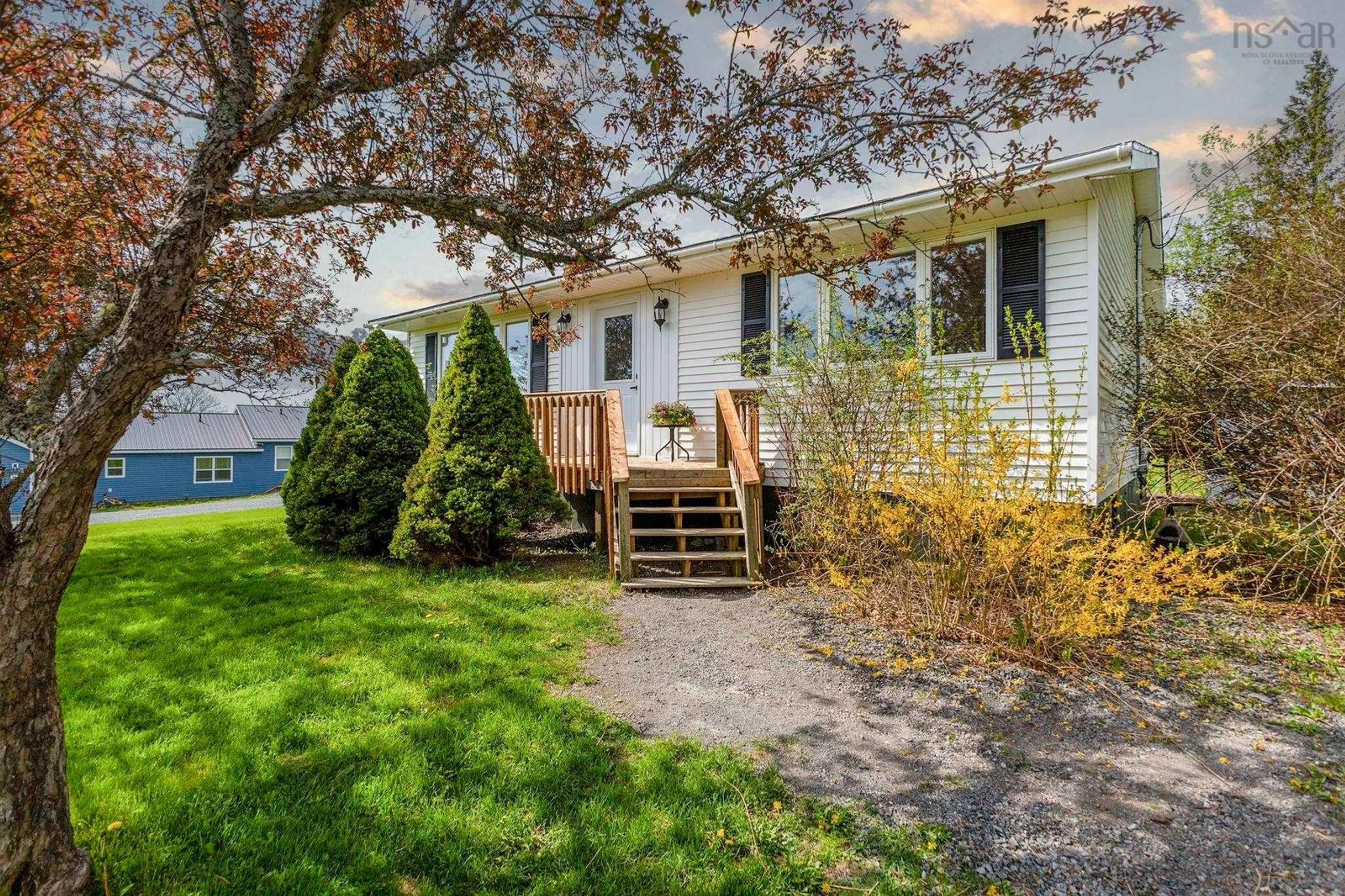 Home with vinyl exterior material, street for 25 Blackie Rd, Lyons Brook Nova Scotia B0K 1H0