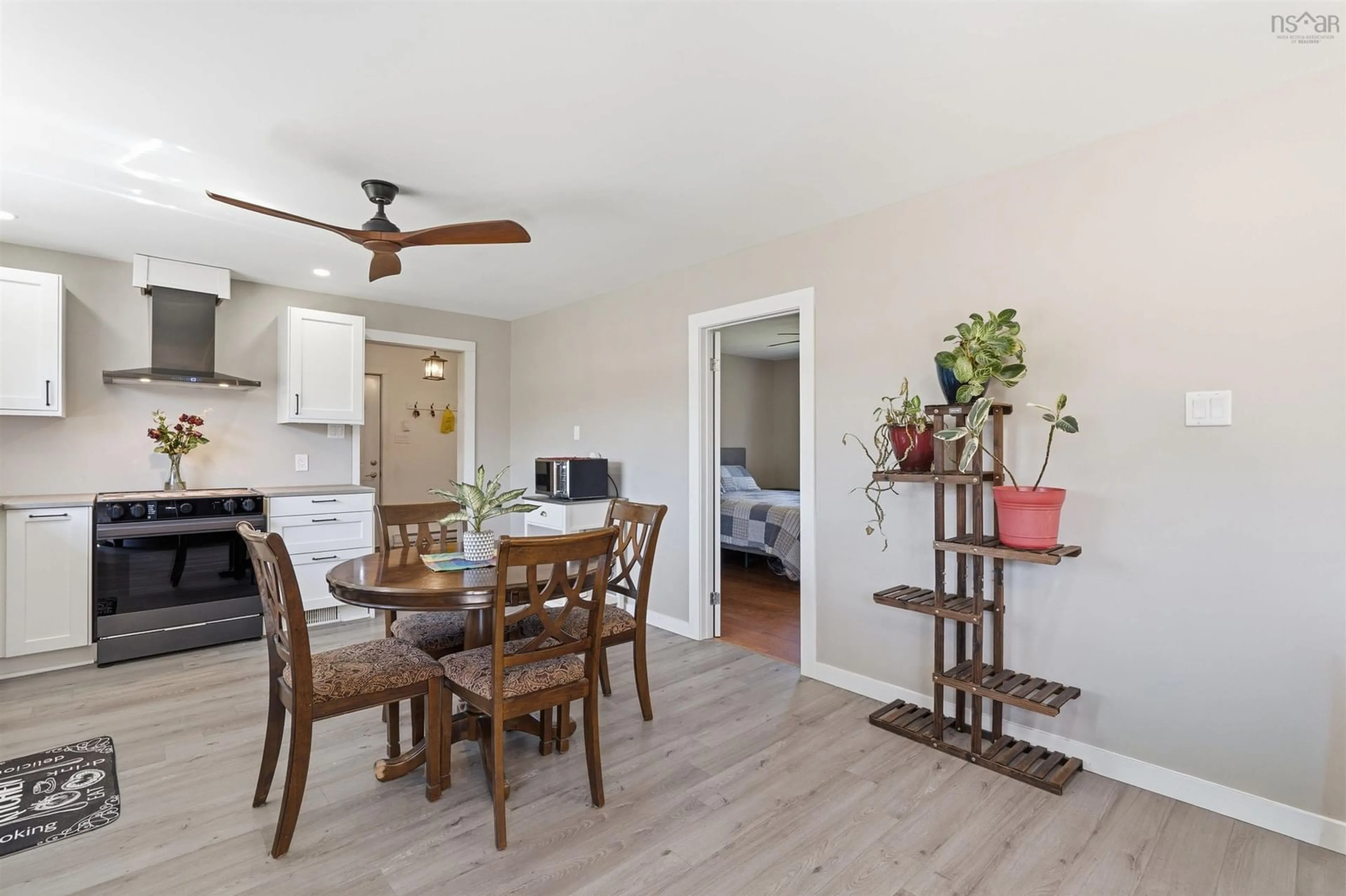 Open concept kitchen, wood/laminate floor for 256 Dyke Rd, Cow Bay Nova Scotia B3G 1K3