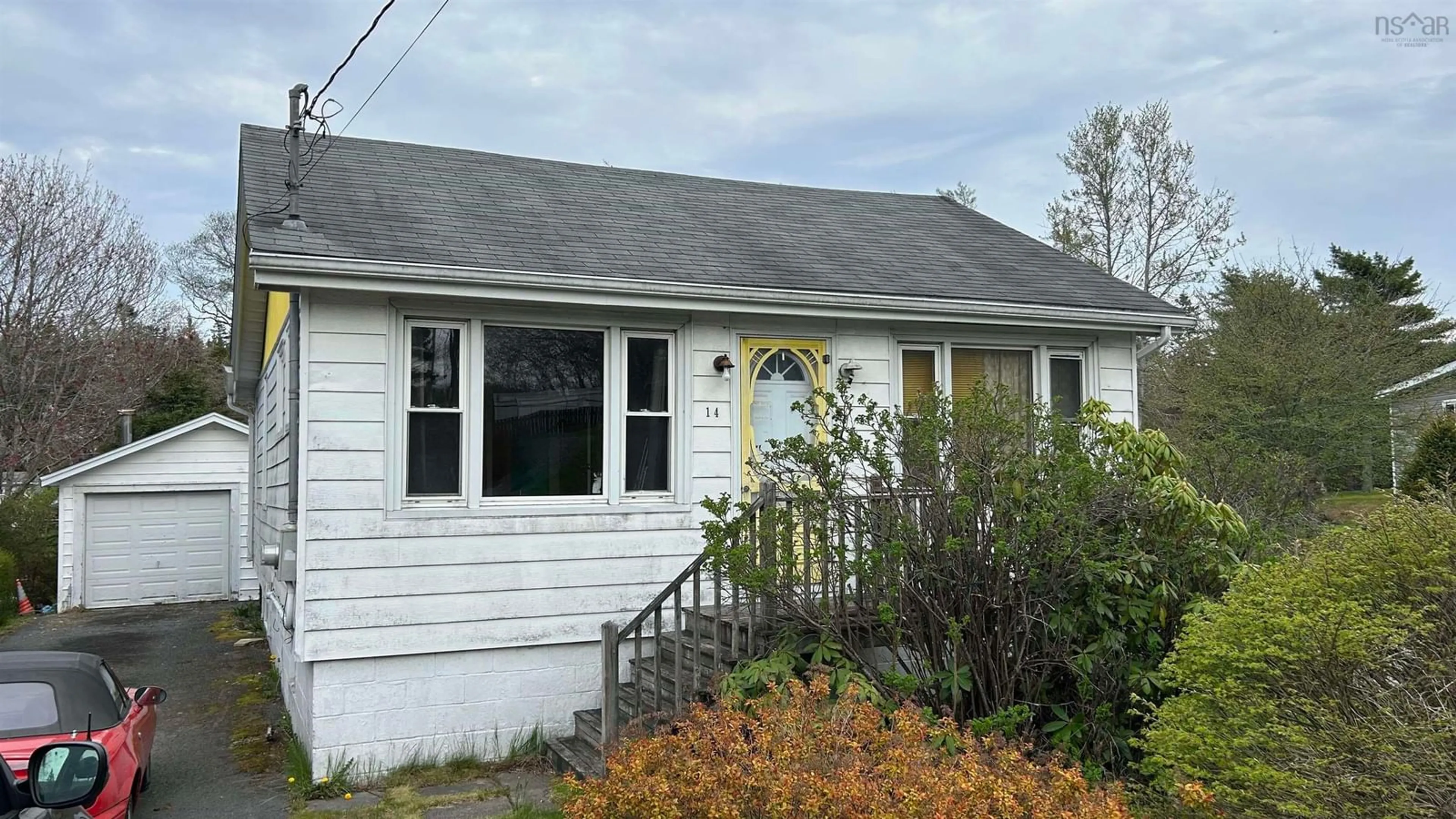 Home with vinyl exterior material, street for 14 Terence Bay Rd, Whites Lake Nova Scotia B3T 1W4