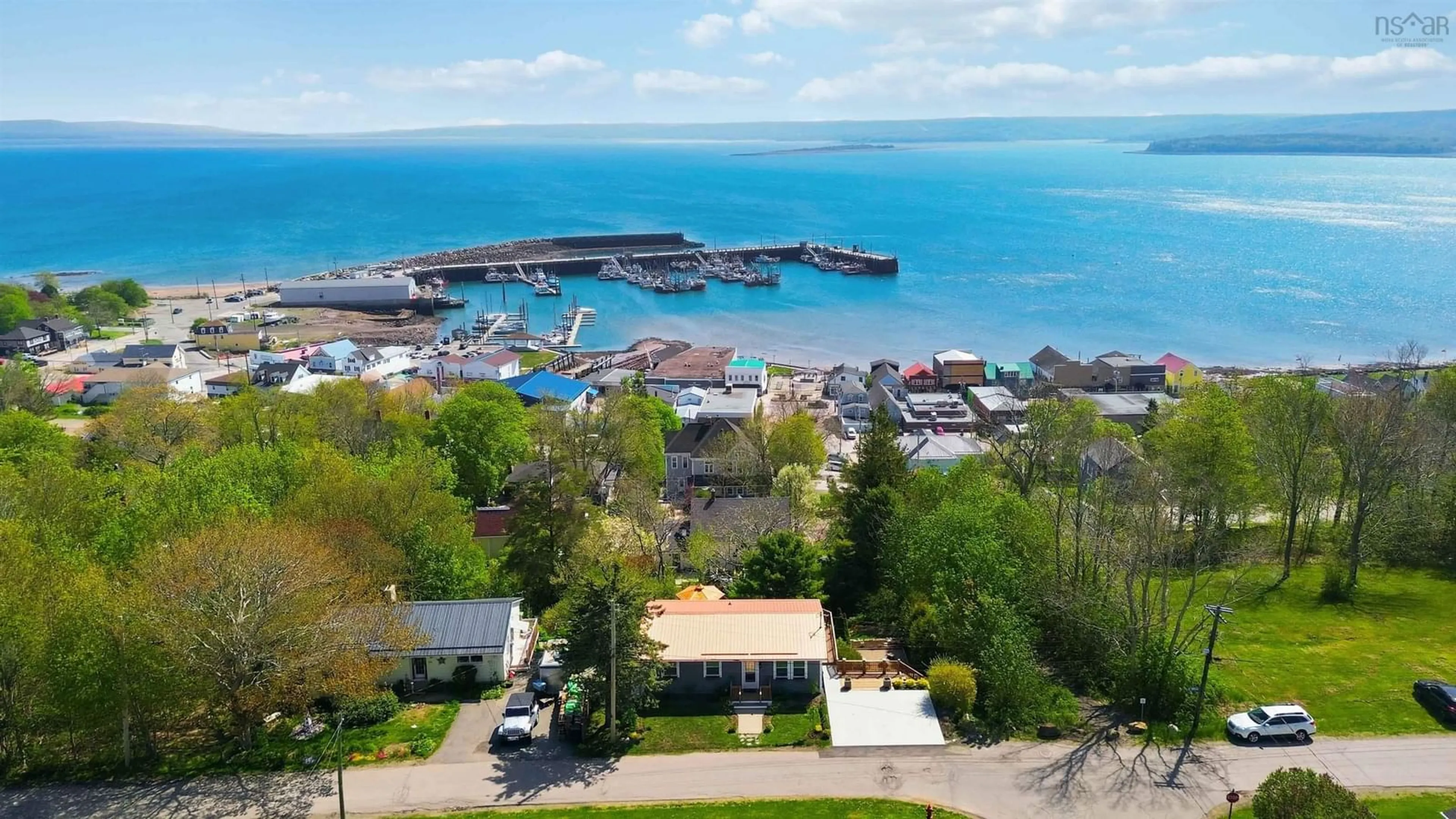 A pic from outside/outdoor area/front of a property/back of a property/a pic from drone, water/lake/river/ocean view for 152 Second Ave, Digby Nova Scotia B0V 1A0