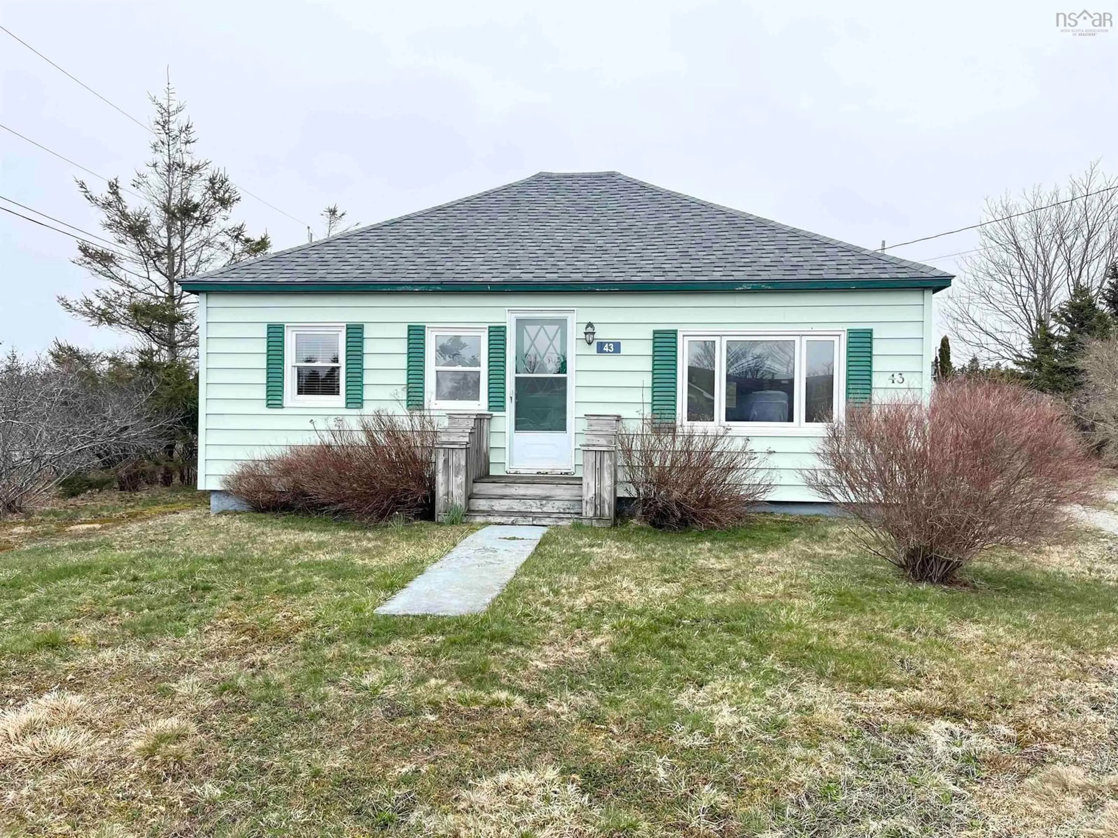Home with vinyl exterior material, street for 43 Hibbert St, Clark's Harbour Nova Scotia B0W 1P0