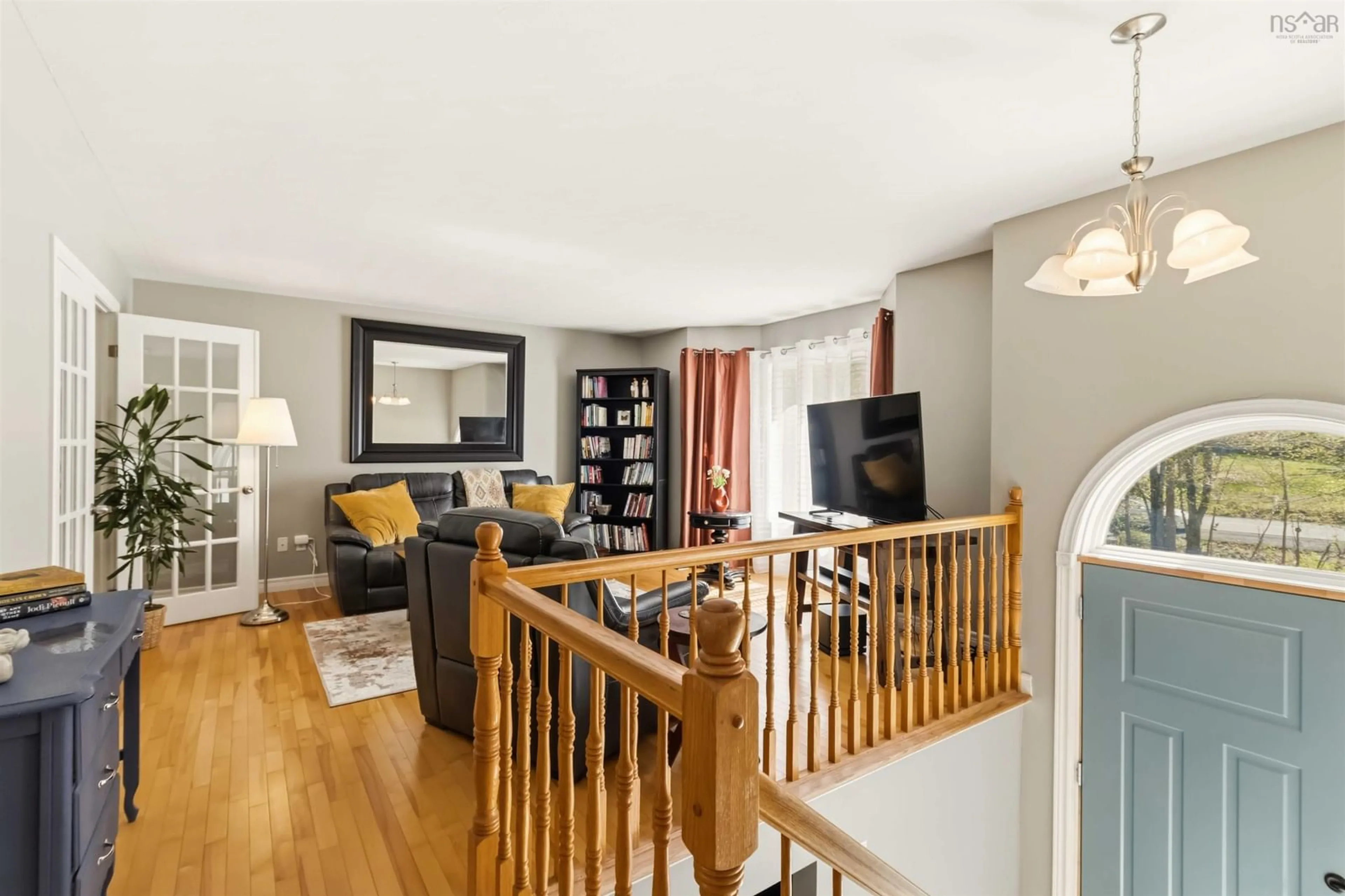Living room with furniture, wood/laminate floor for 1 St George Blvd, Hammonds Plains Nova Scotia B4B 1K7