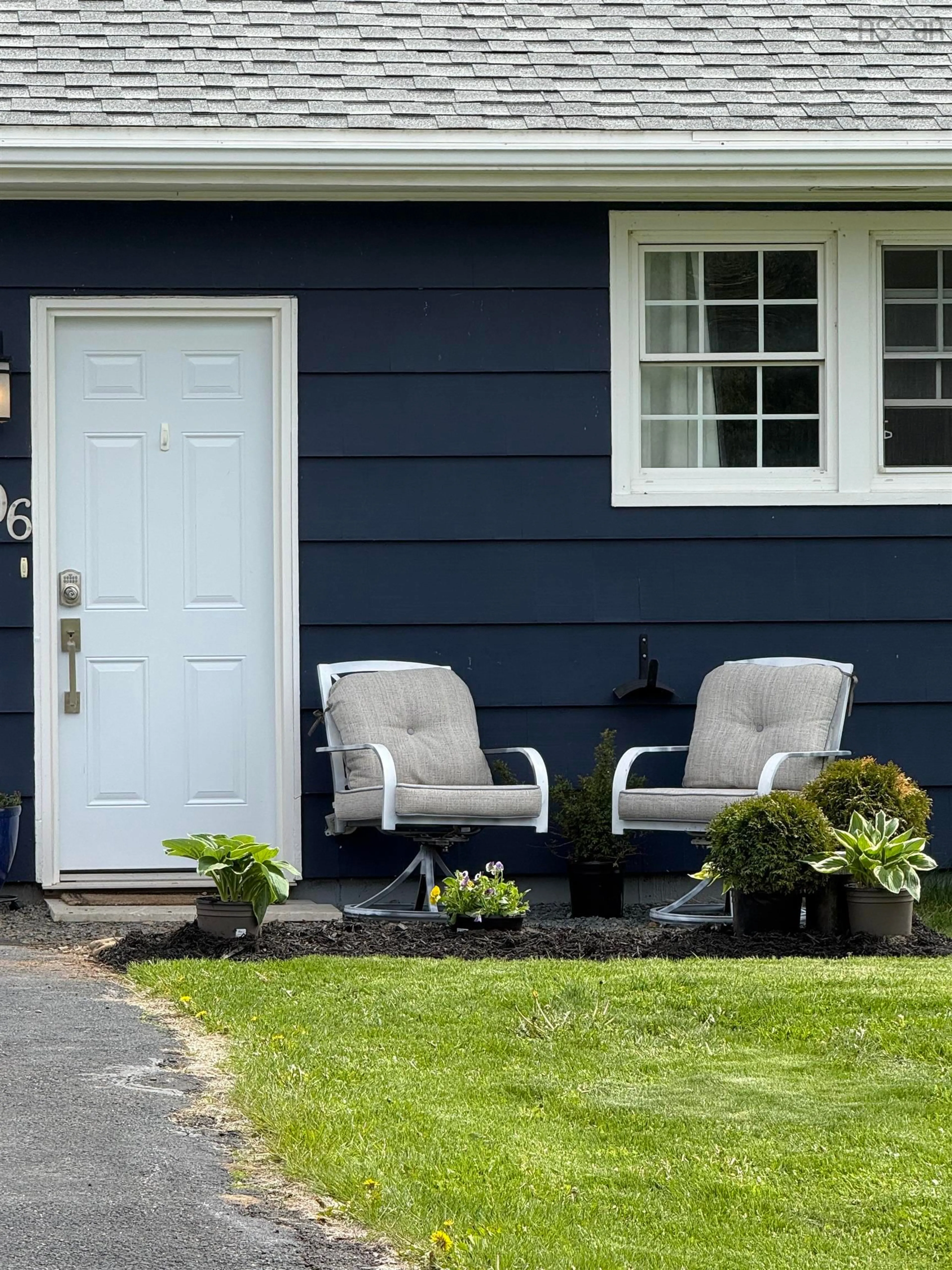 Home with vinyl exterior material, street for 1506 Cape Split Rd, Scots Bay Nova Scotia B0P 1H0