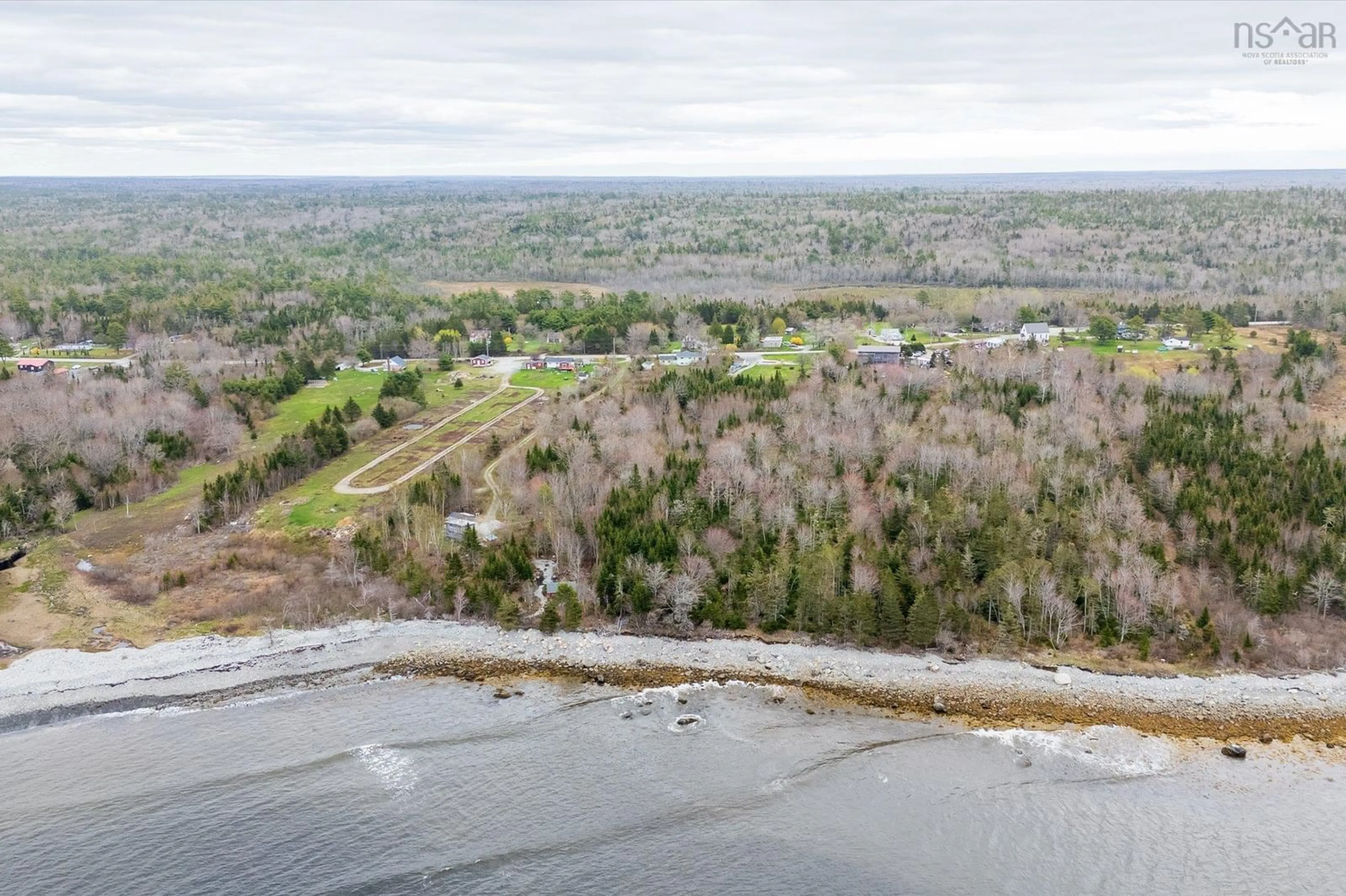 A pic from outside/outdoor area/front of a property/back of a property/a pic from drone, water/lake/river/ocean view for 5407 Highway 3, East Jordan Nova Scotia B0T 1J0