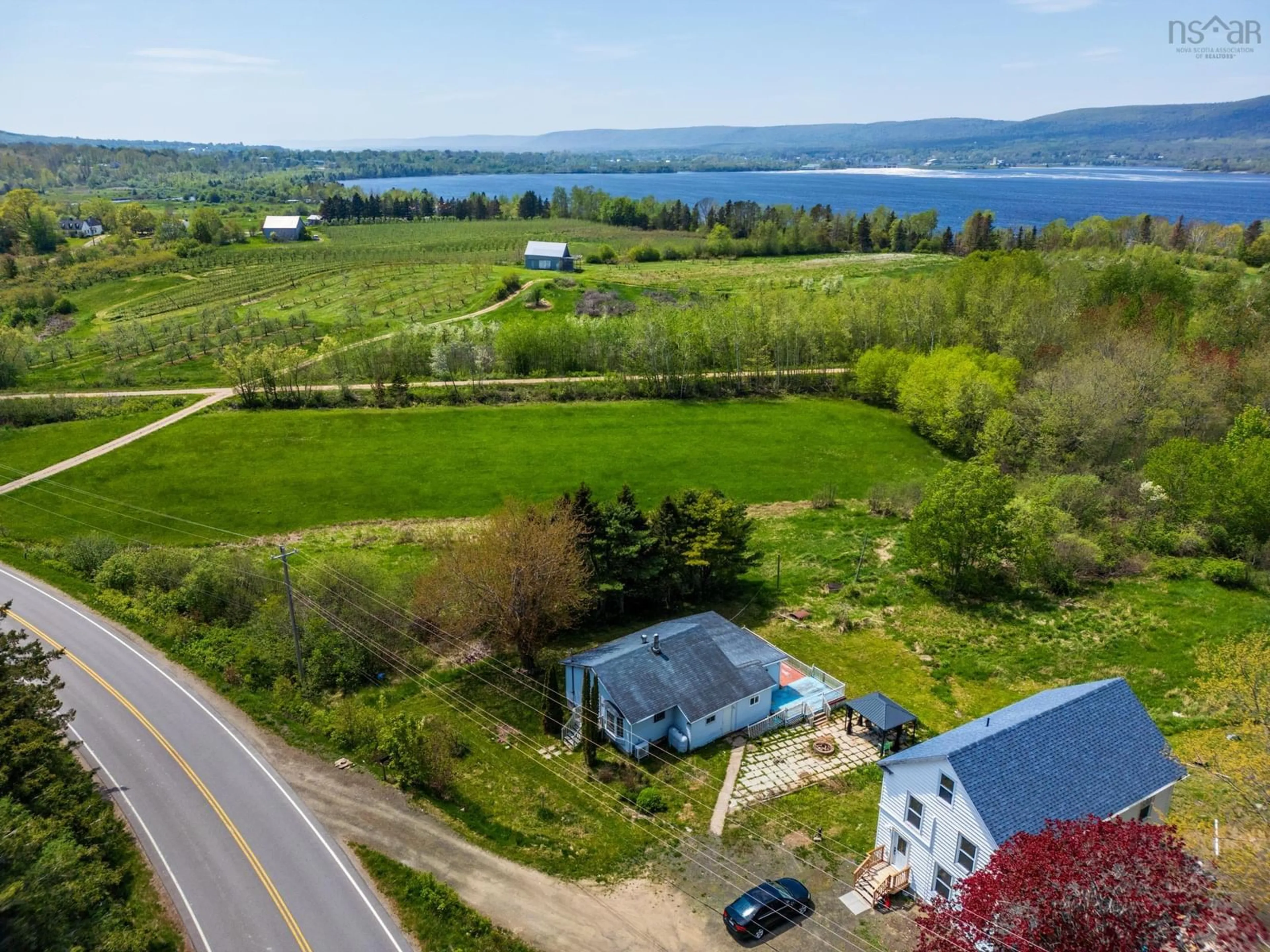 A pic from outside/outdoor area/front of a property/back of a property/a pic from drone, water/lake/river/ocean view for 445 Highway 201, Moschelle Nova Scotia B0S 1A0