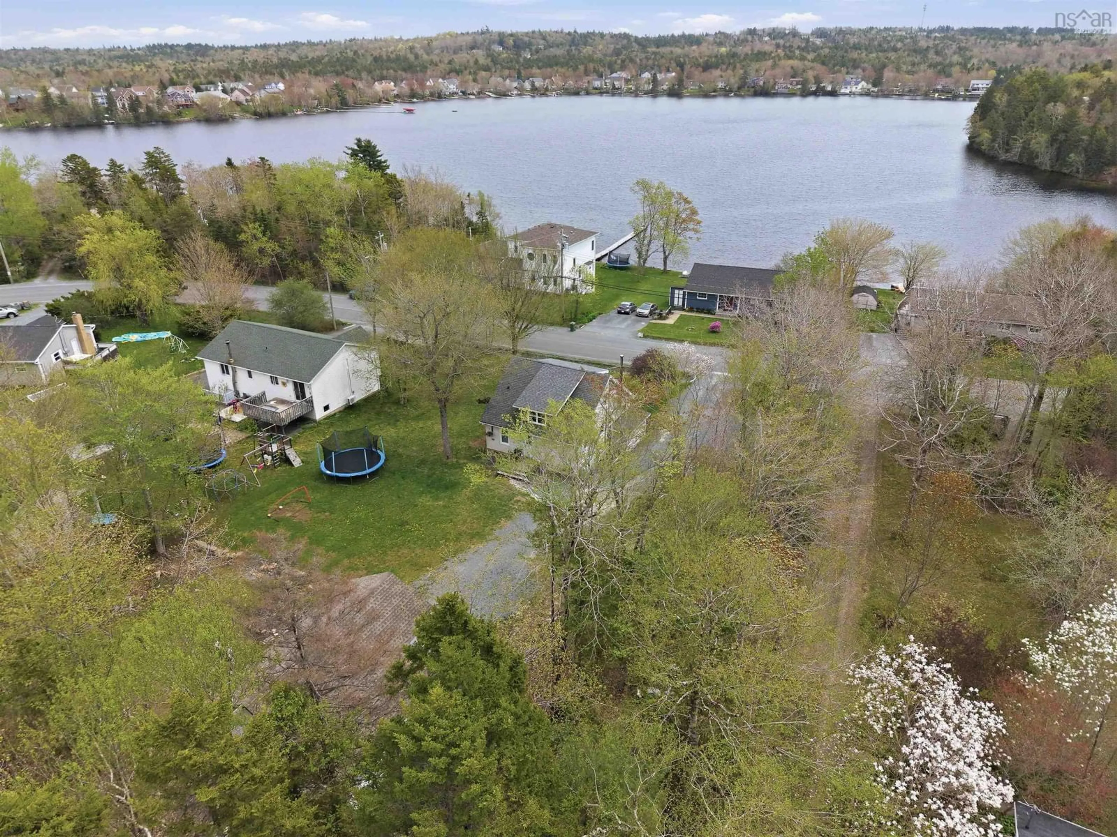 A pic from outside/outdoor area/front of a property/back of a property/a pic from drone, water/lake/river/ocean view for 340 Lakeview Ave, Middle Sackville Nova Scotia B4E 3B6
