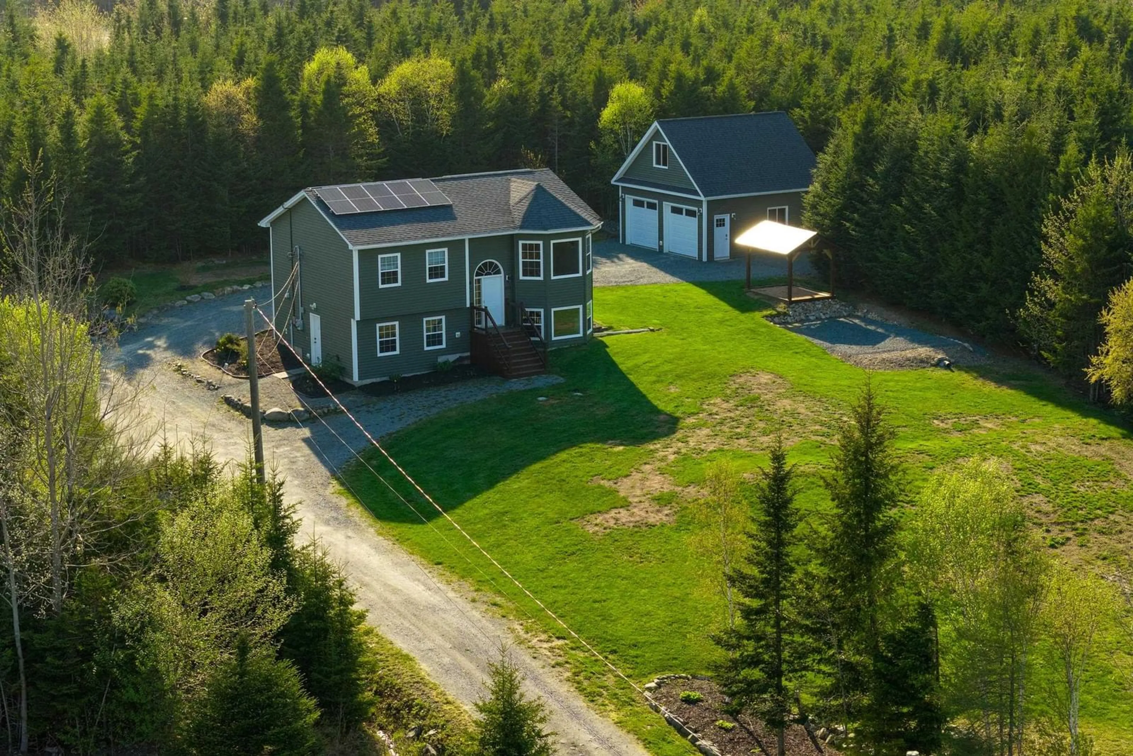 A pic from outside/outdoor area/front of a property/back of a property/a pic from drone, unknown for 215 West Porters Lake Rd, Porters Lake Nova Scotia B3E 1G1