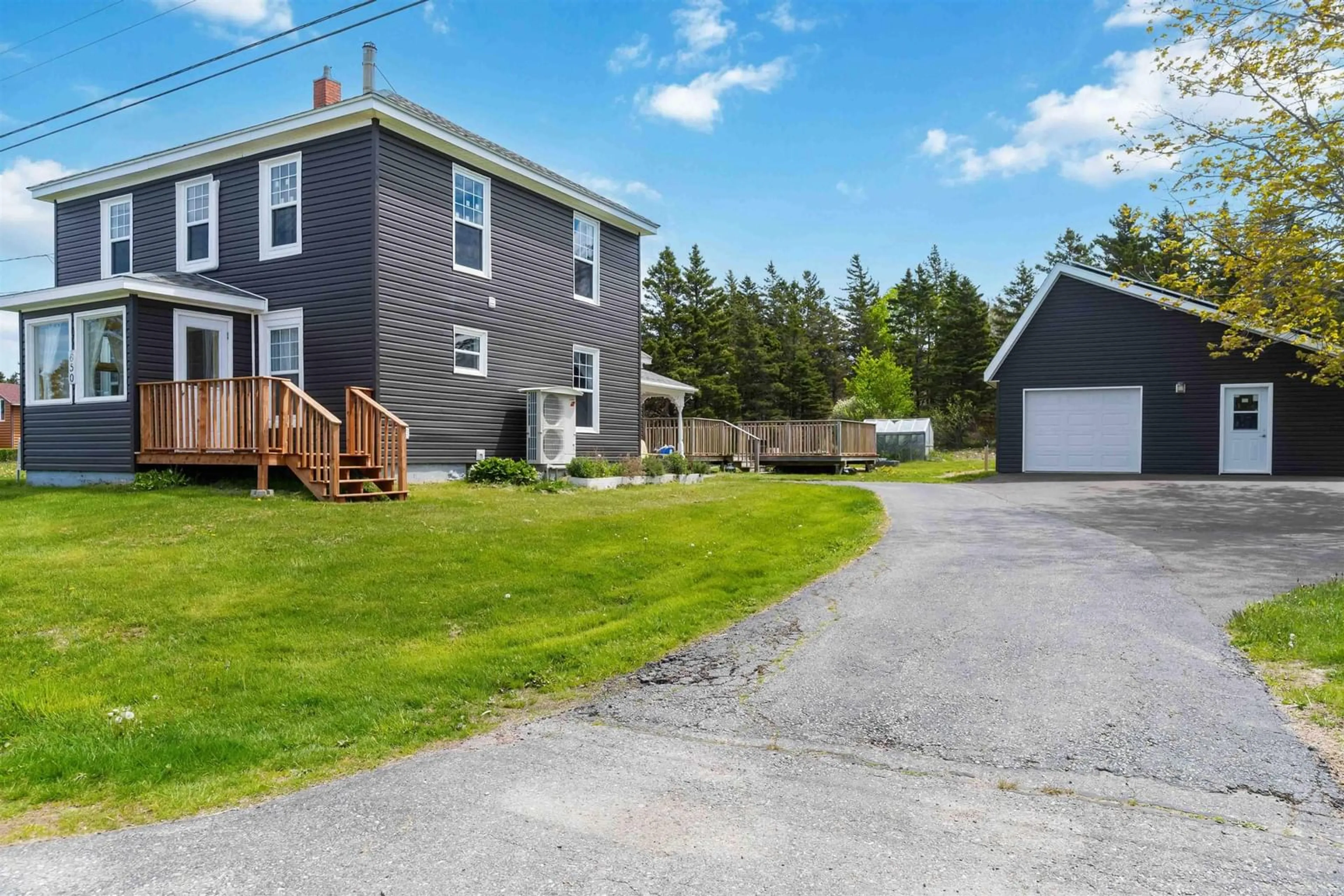 A pic from outside/outdoor area/front of a property/back of a property/a pic from drone, street for 650 Riverside Rd, New Edinburgh Nova Scotia B0W 3T0