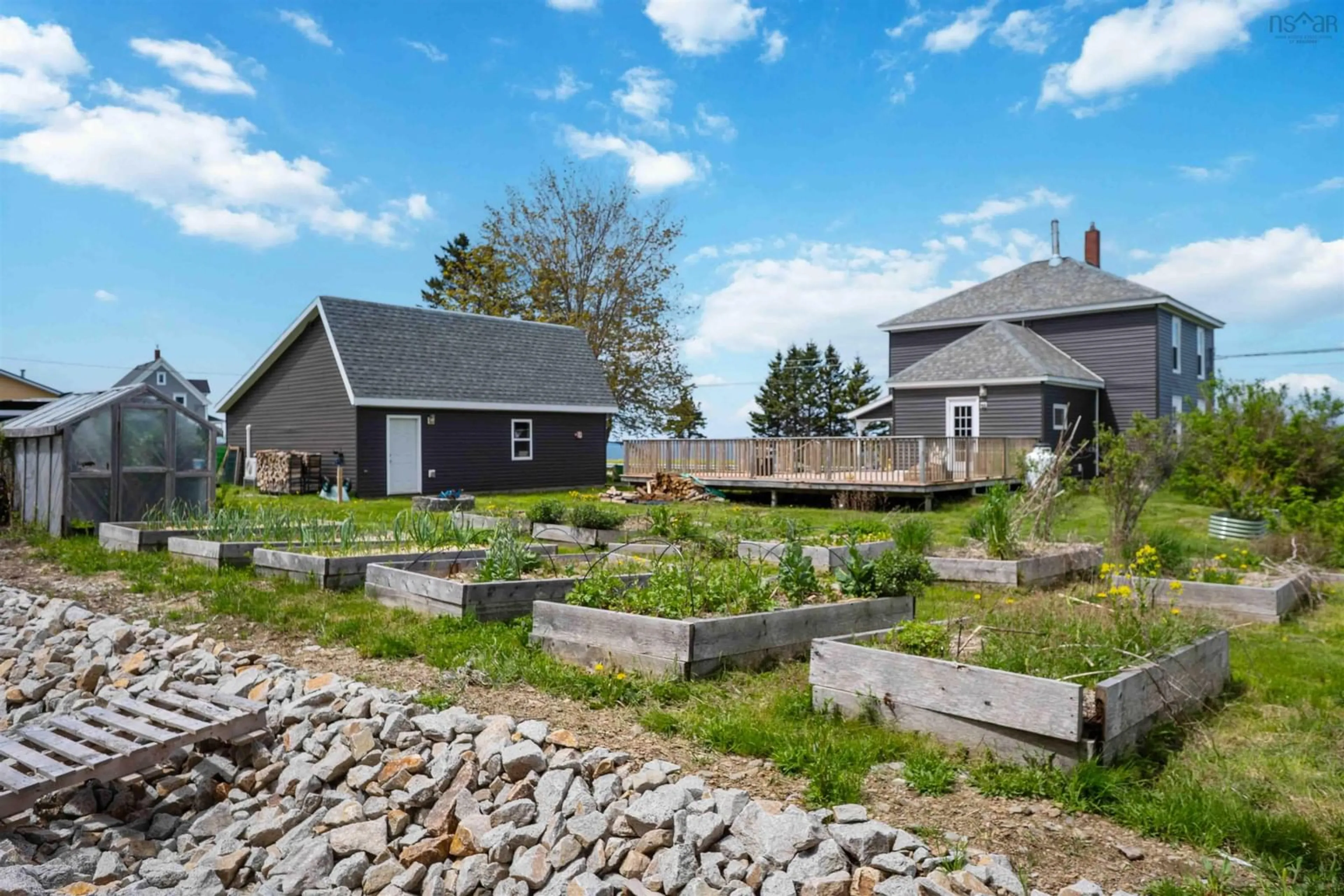 A pic from outside/outdoor area/front of a property/back of a property/a pic from drone, street for 650 Riverside Rd, New Edinburgh Nova Scotia B0W 3T0