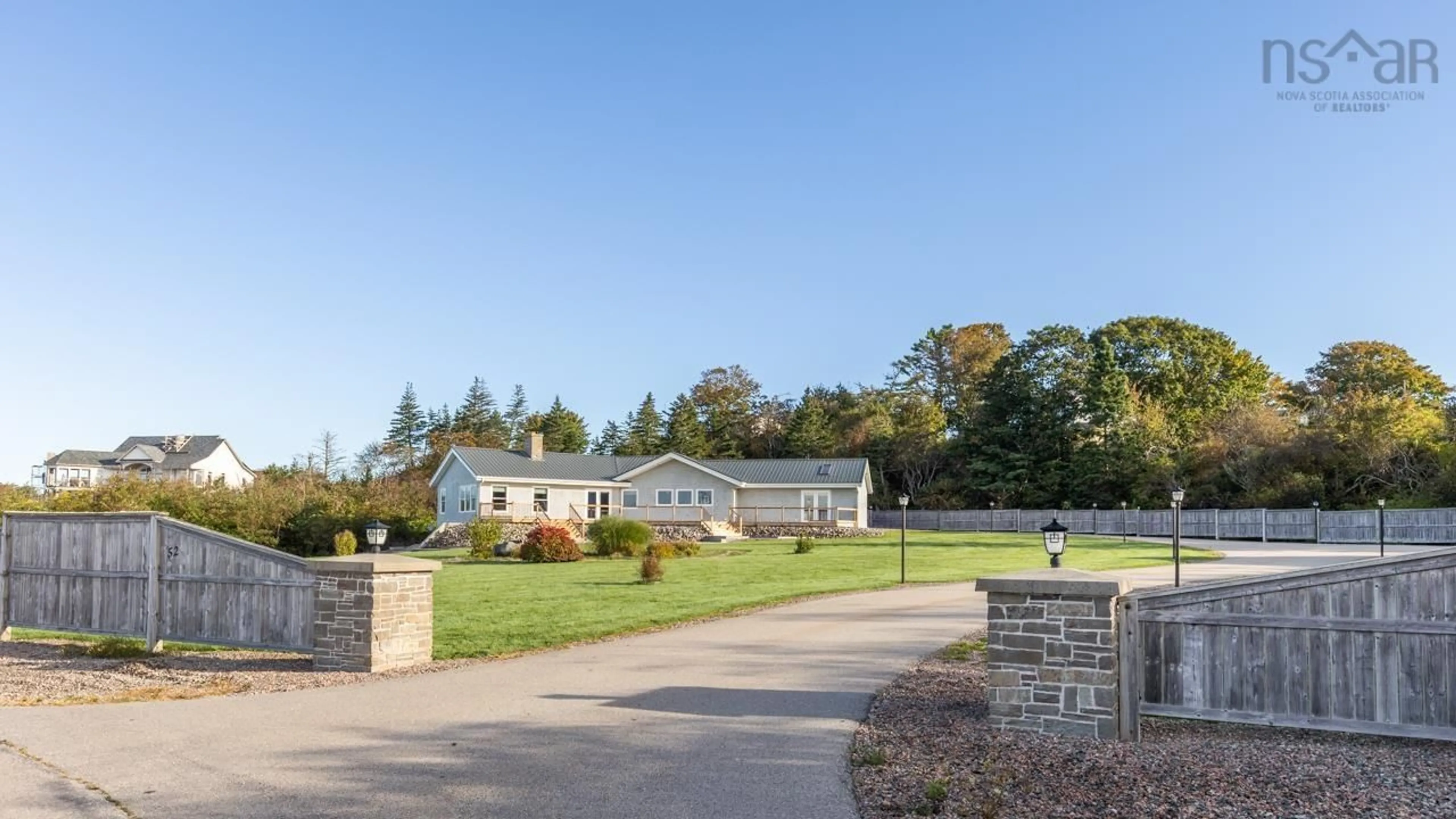 A pic from outside/outdoor area/front of a property/back of a property/a pic from drone, mountain view for 52 Captain Landers Crt, Yarmouth Nova Scotia B5A 2Y6