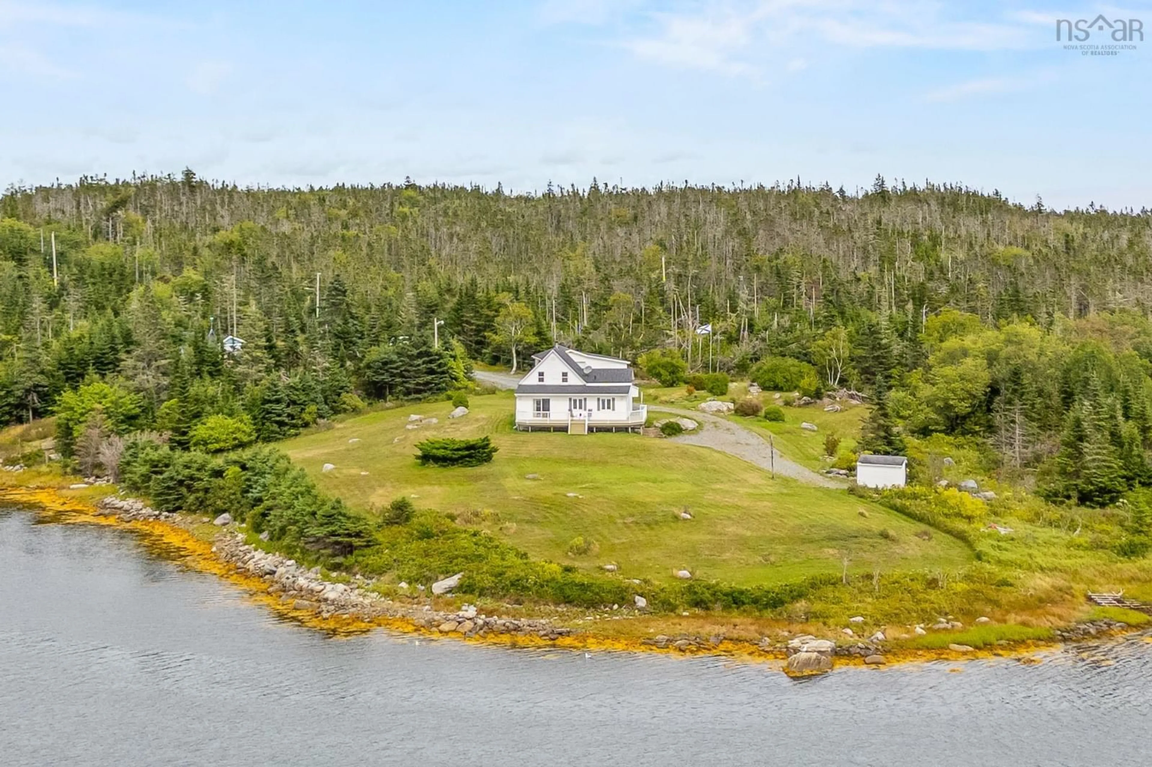 A pic from outside/outdoor area/front of a property/back of a property/a pic from drone, water/lake/river/ocean view for 125 Powers Rd, Tangier Nova Scotia B0J 3H0