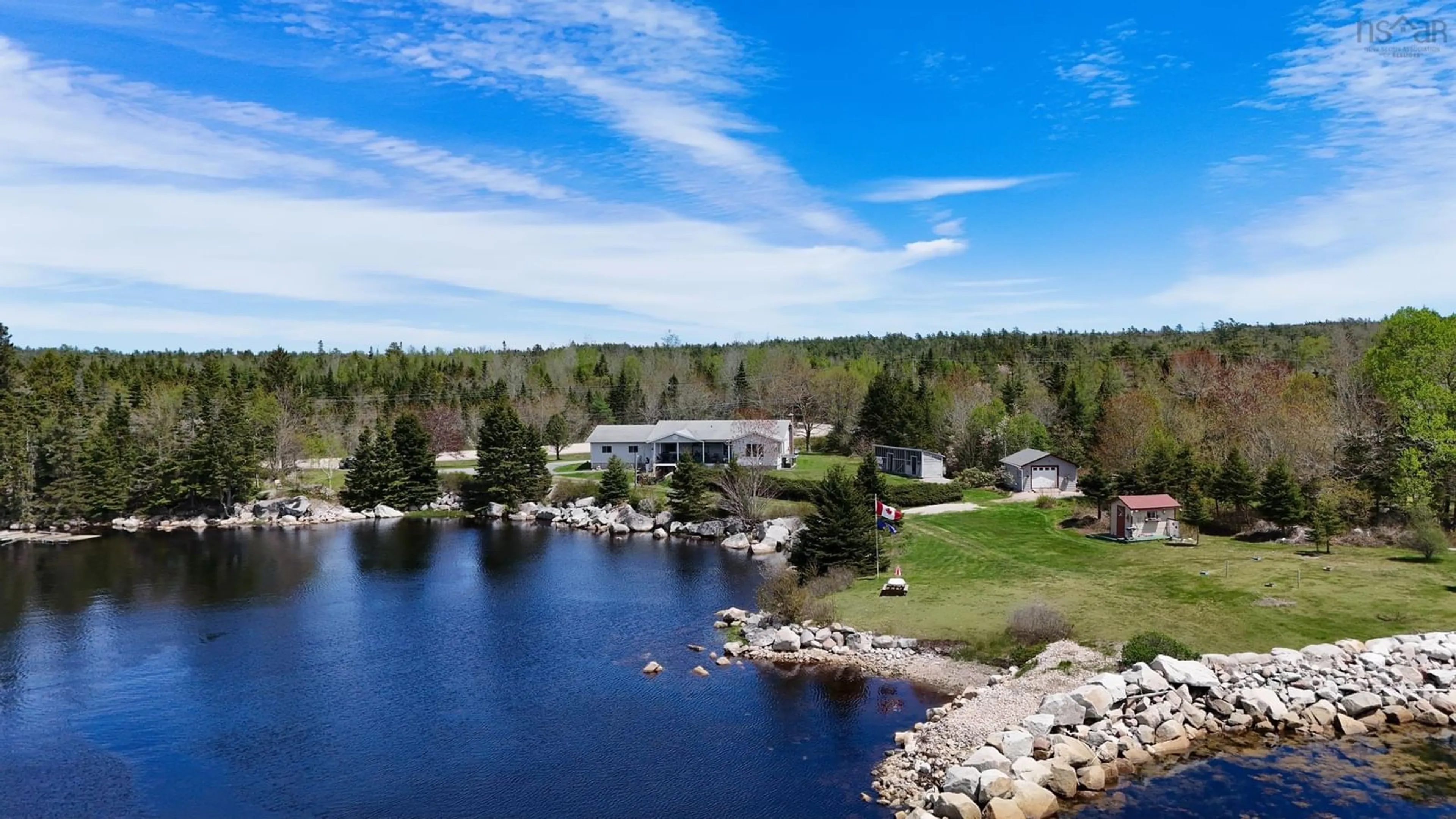 A pic from outside/outdoor area/front of a property/back of a property/a pic from drone, water/lake/river/ocean view for 7239 Highway 329, East River Point Nova Scotia B0J 1T0