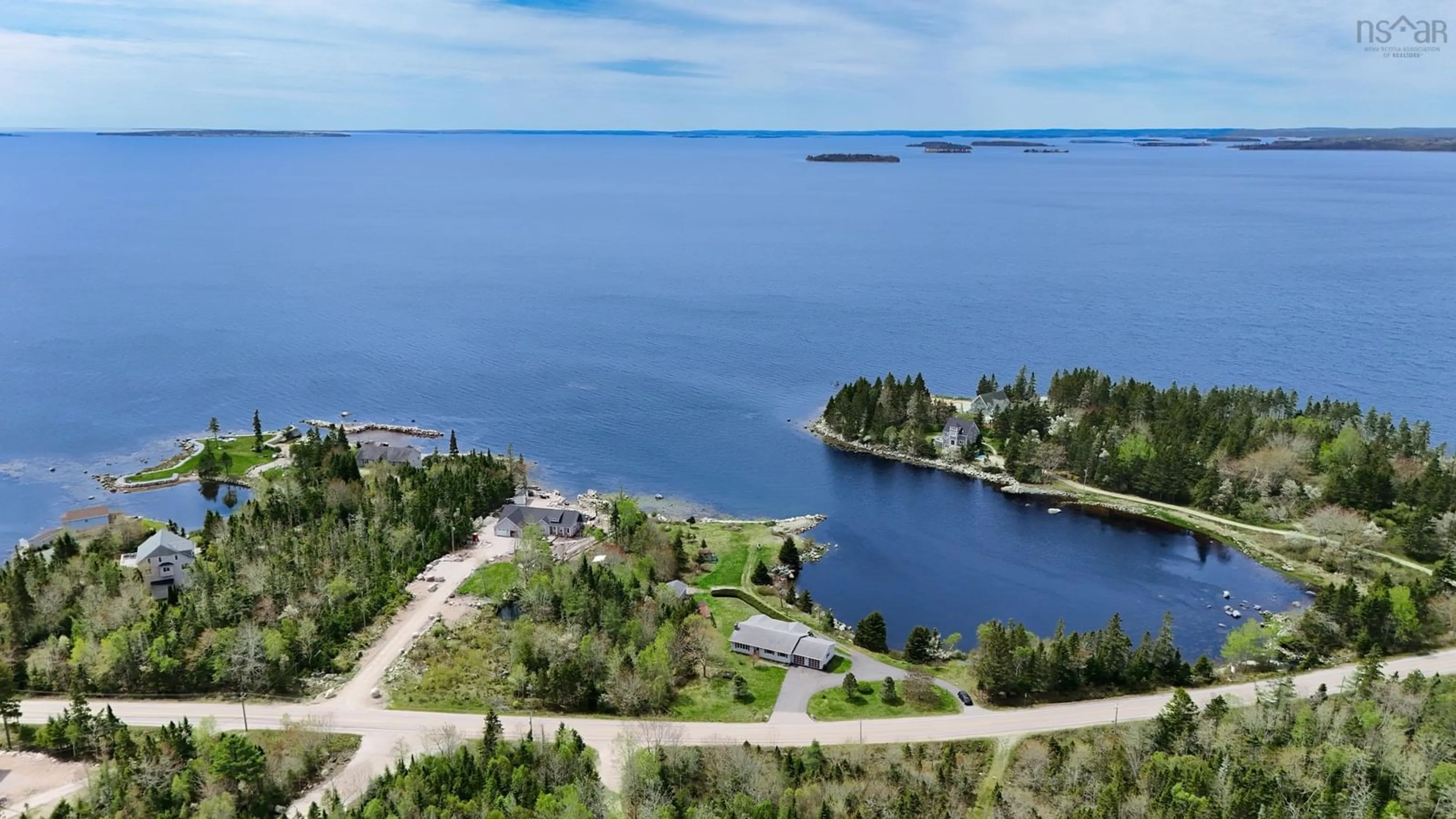 A pic from outside/outdoor area/front of a property/back of a property/a pic from drone, water/lake/river/ocean view for 7239 Highway 329, East River Point Nova Scotia B0J 1T0