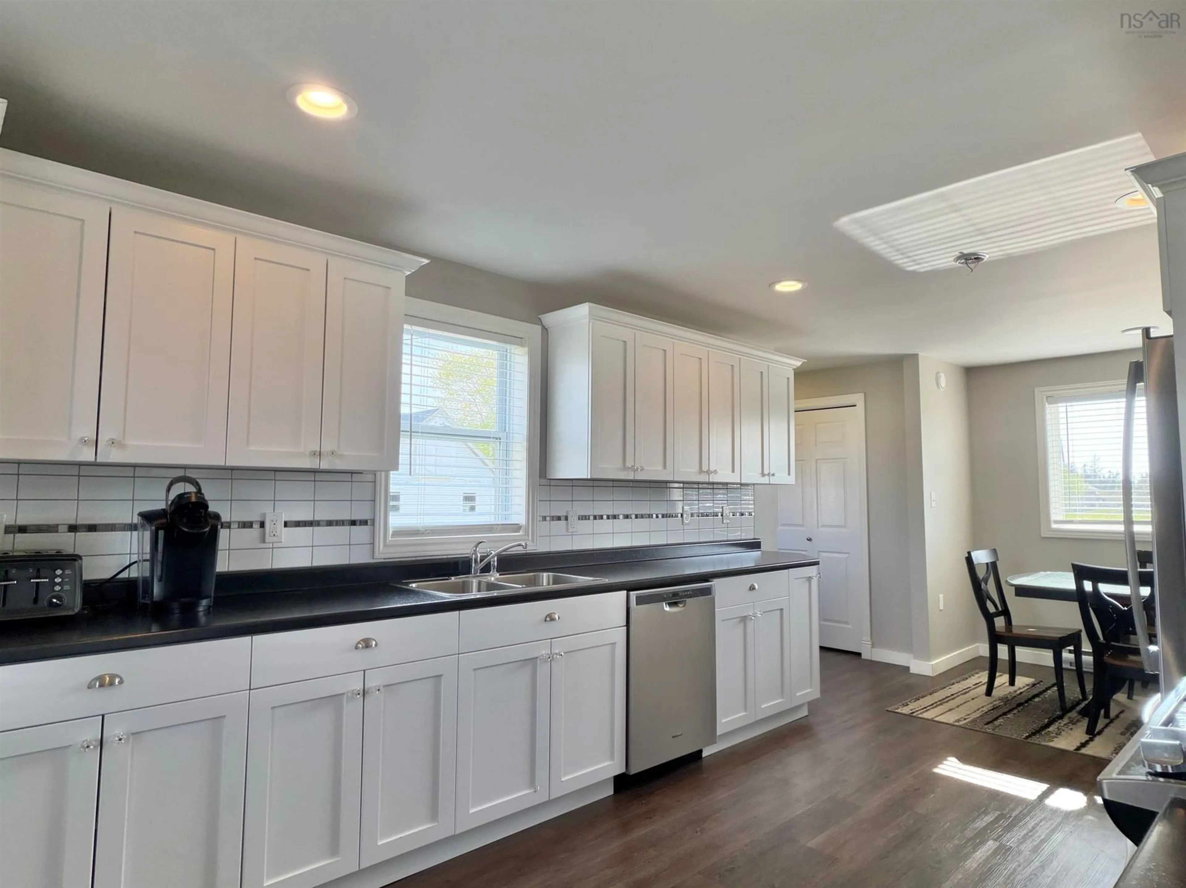 Open concept kitchen, ceramic/tile floor for 1850 Highway 335, Lower West Pubnico Nova Scotia B0W 2C0