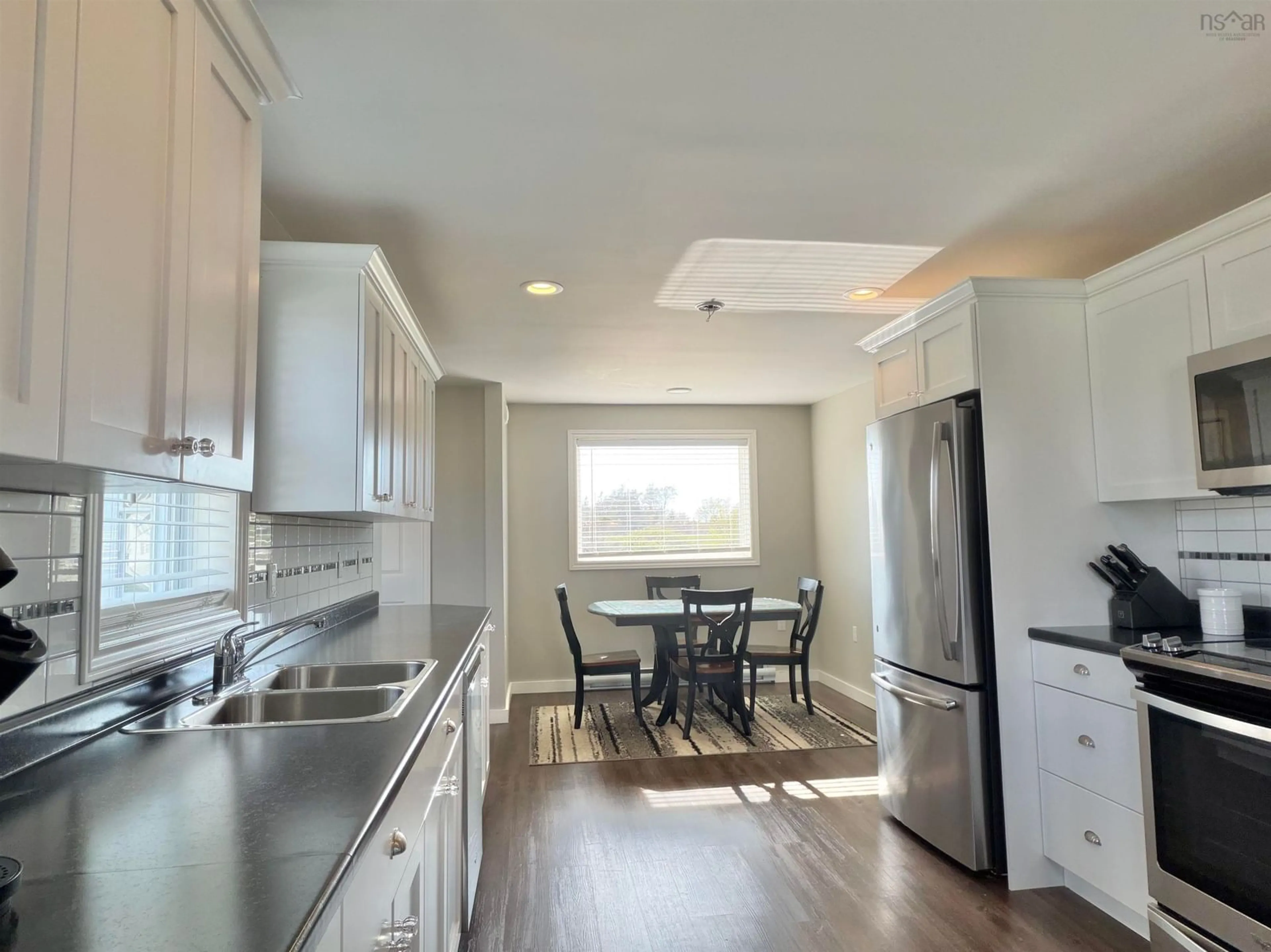 Open concept kitchen, unknown for 1850 Highway 335, Lower West Pubnico Nova Scotia B0W 2C0