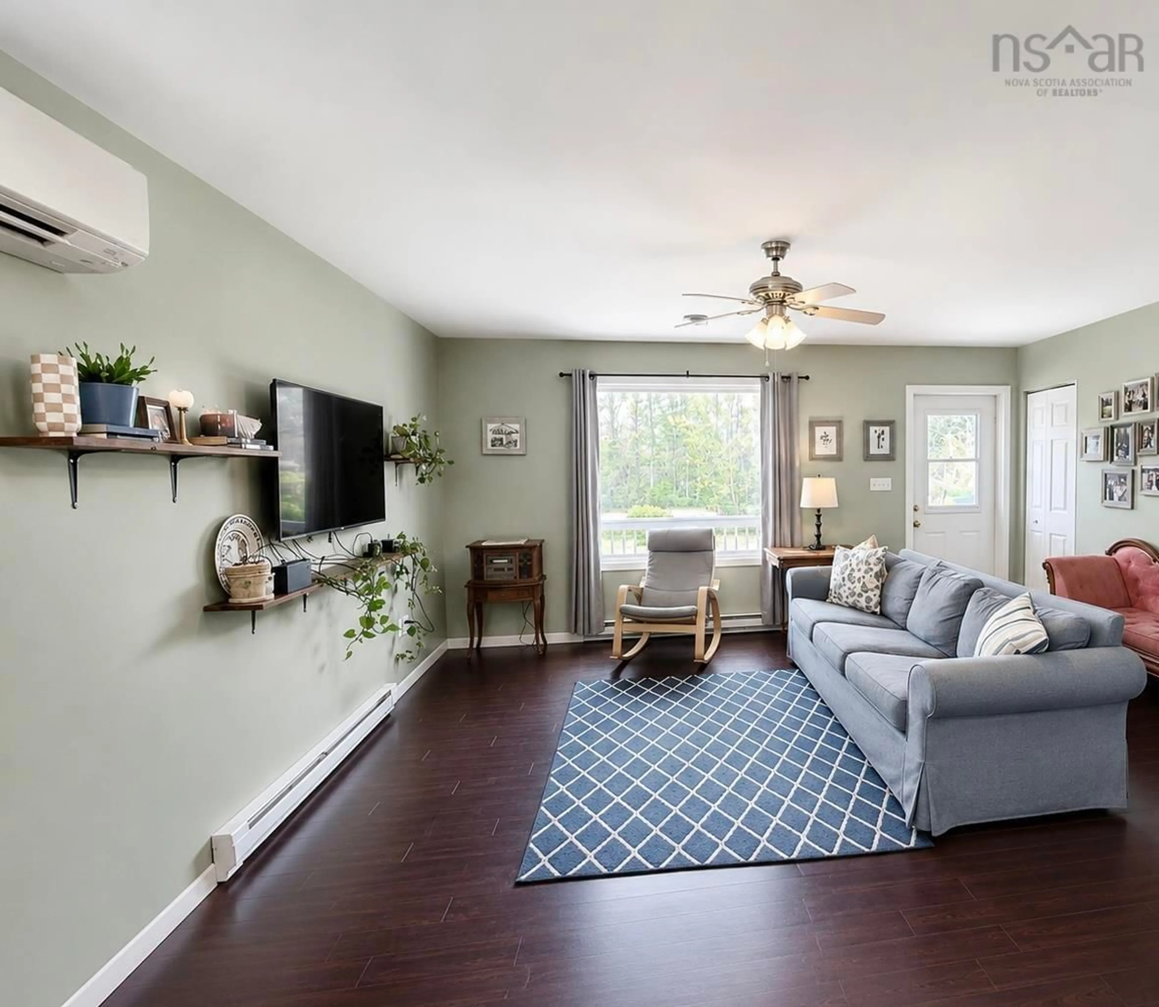 Living room with furniture, wood/laminate floor for 144 Chemin Du Mecoque, Abrams River Nova Scotia B0W 3M0