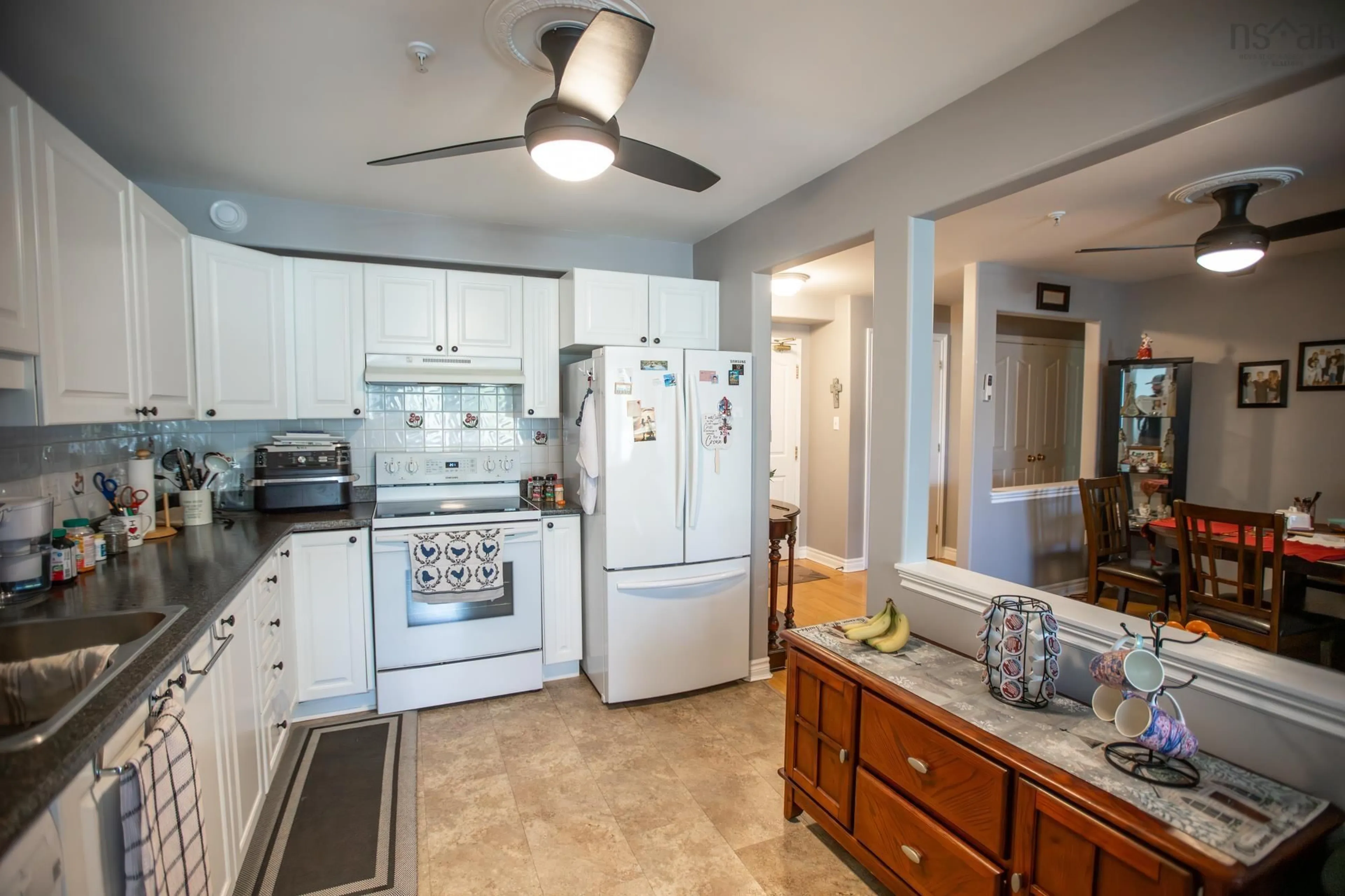 Open concept kitchen, ceramic/tile floor for 211 Hammonds Plains Rd #406, Bedford Nova Scotia B4A 4L4