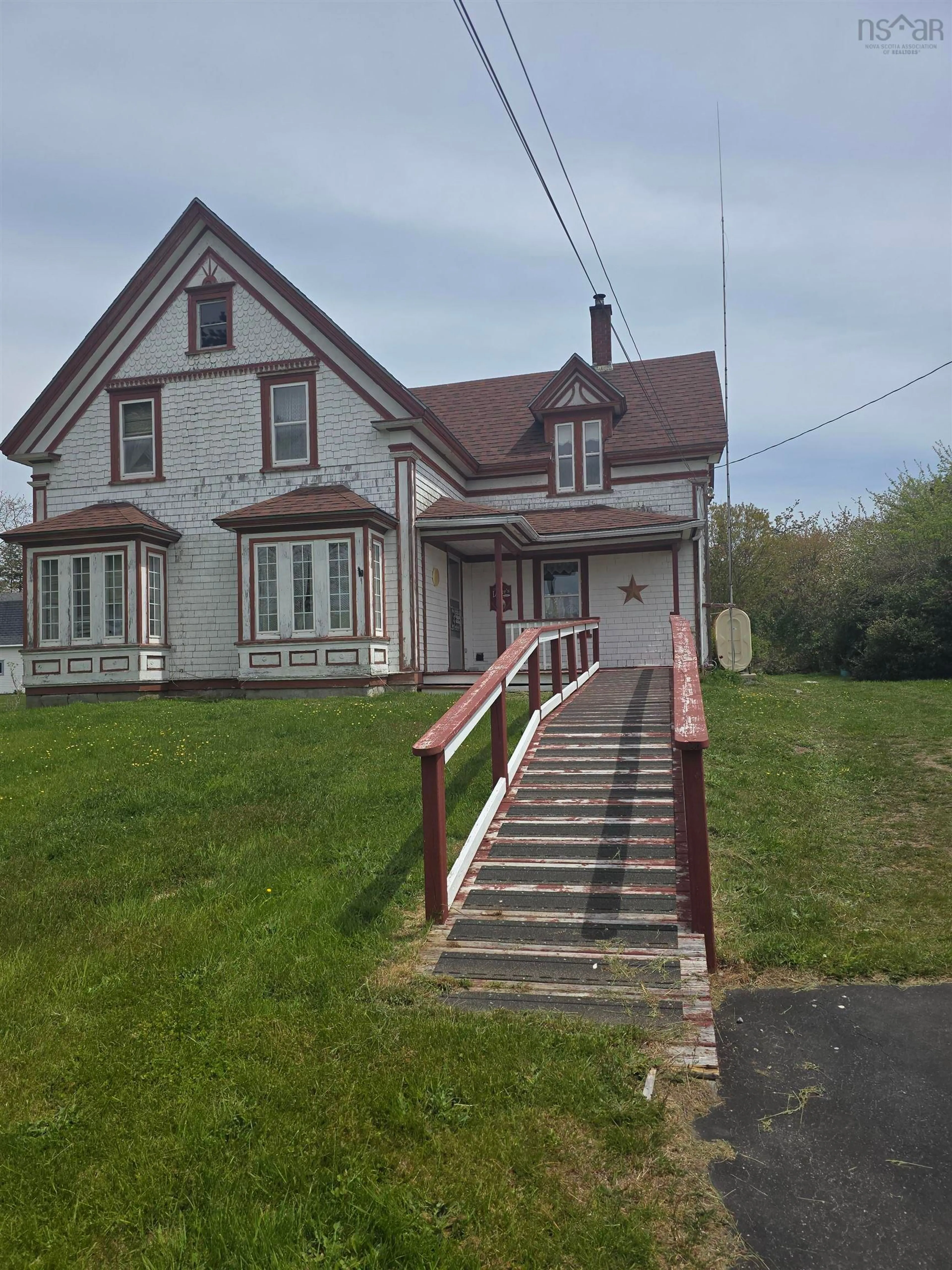 A pic from outside/outdoor area/front of a property/back of a property/a pic from drone, street for 2067 Sandy Point Rd, Sandy Point Nova Scotia B0T 1W0