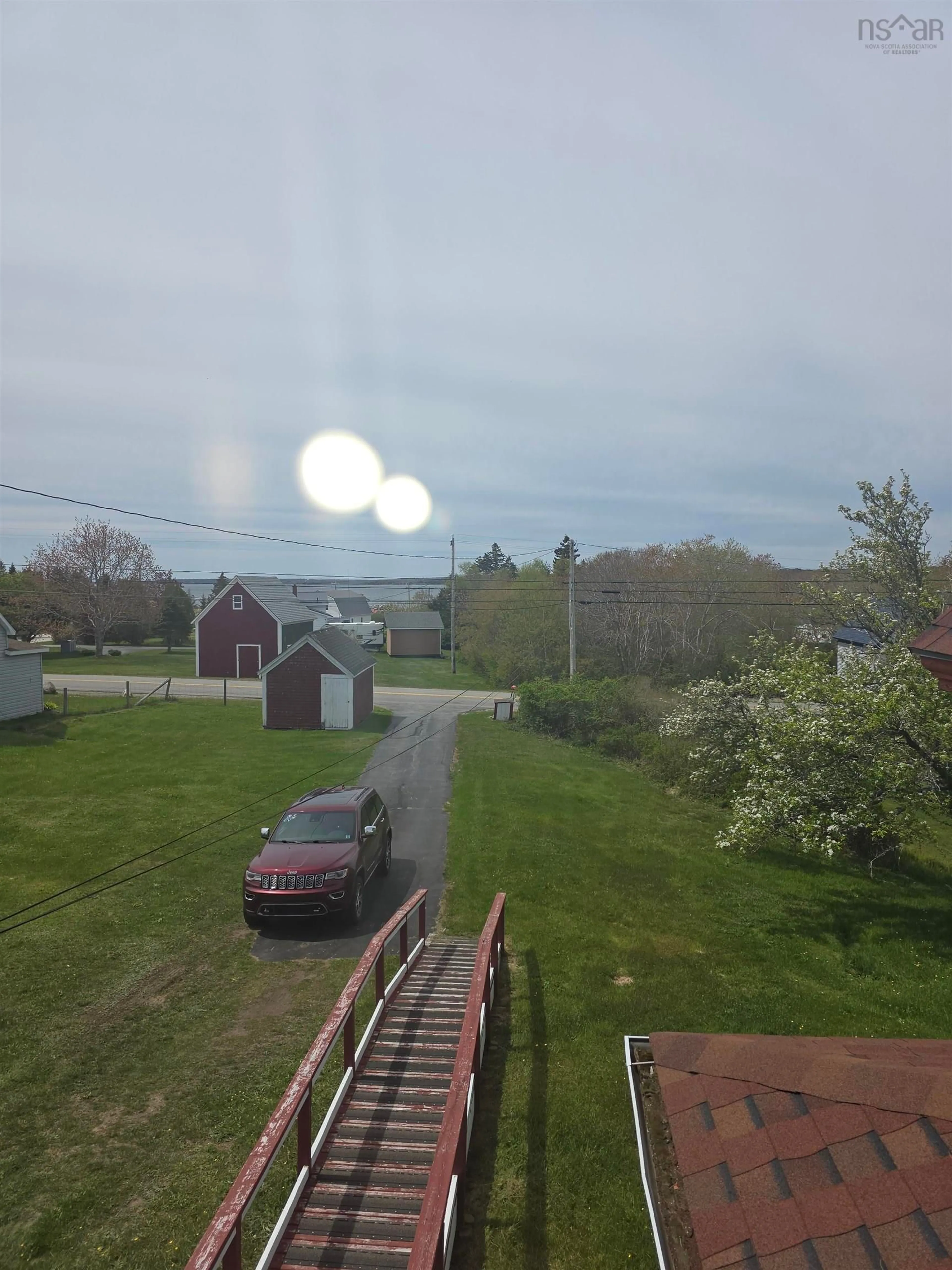 A pic from outside/outdoor area/front of a property/back of a property/a pic from drone, unknown for 2067 Sandy Point Rd, Sandy Point Nova Scotia B0T 1W0