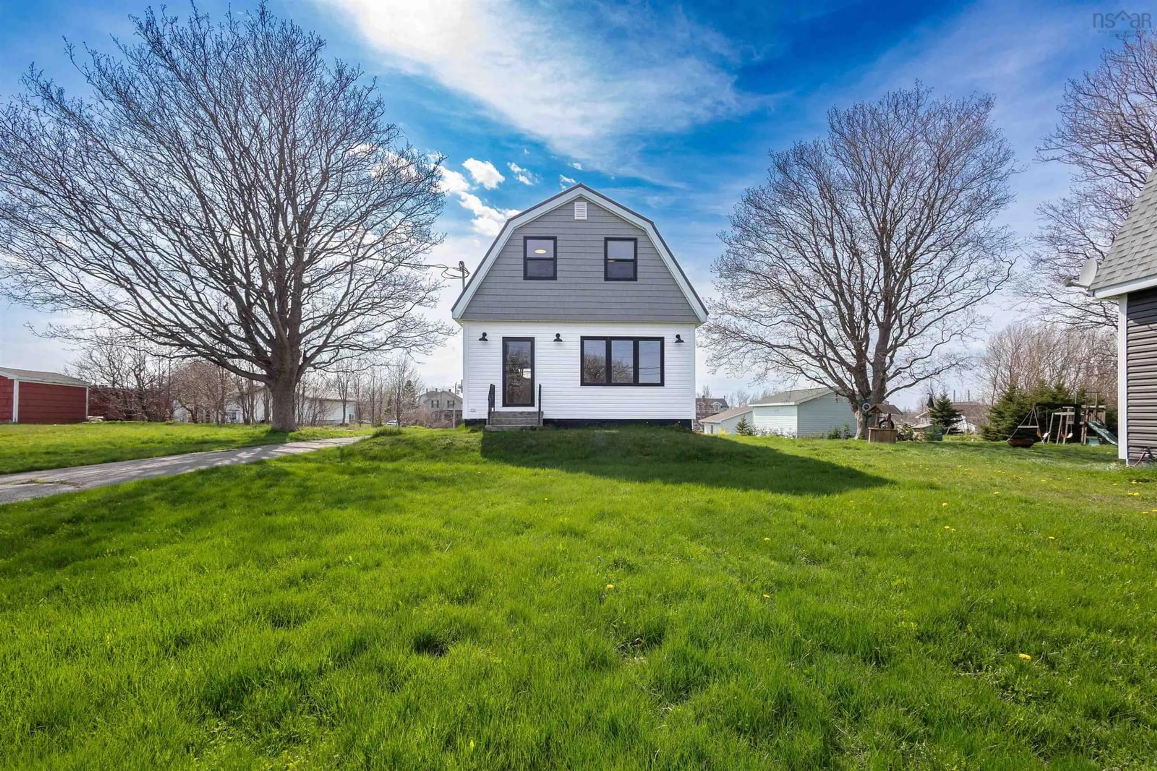 A pic from outside/outdoor area/front of a property/back of a property/a pic from drone, water/lake/river/ocean view for 49 Ocean Ave, Dominion Nova Scotia B1G 1J7