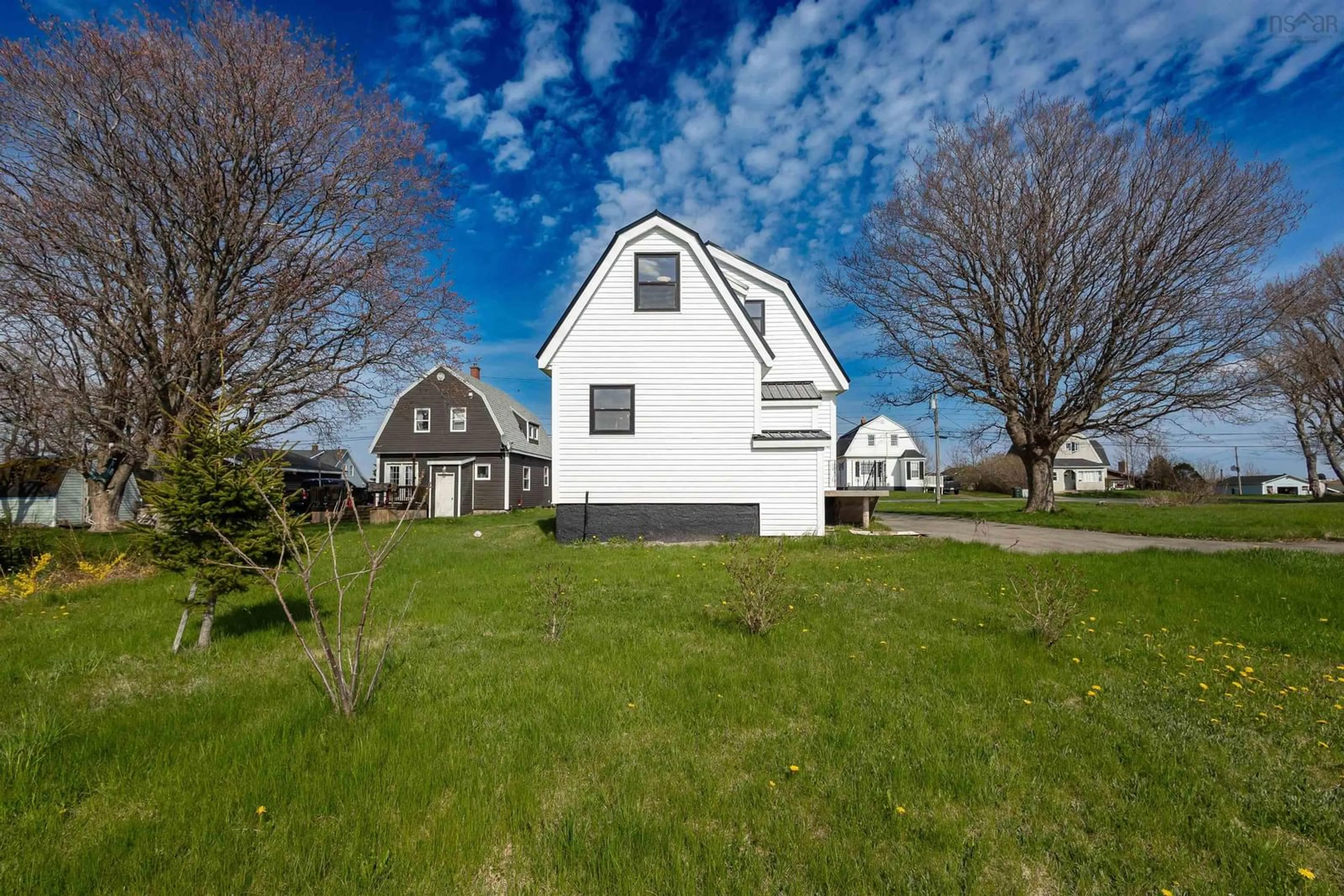 A pic from outside/outdoor area/front of a property/back of a property/a pic from drone, street for 49 Ocean Ave, Dominion Nova Scotia B1G 1J7