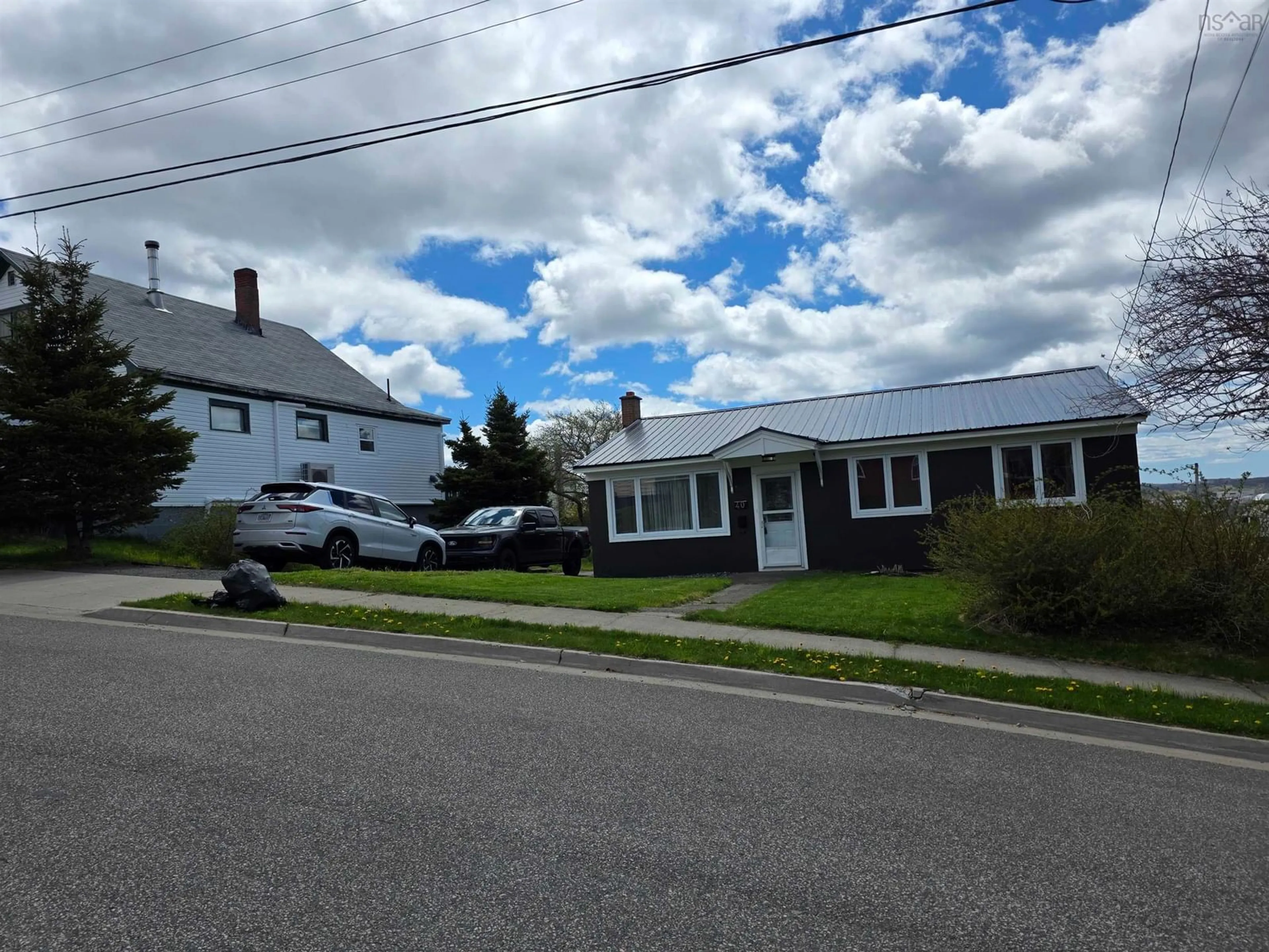 A pic from outside/outdoor area/front of a property/back of a property/a pic from drone, street for 40 Breton St, Sydney Nova Scotia B1N 2P1