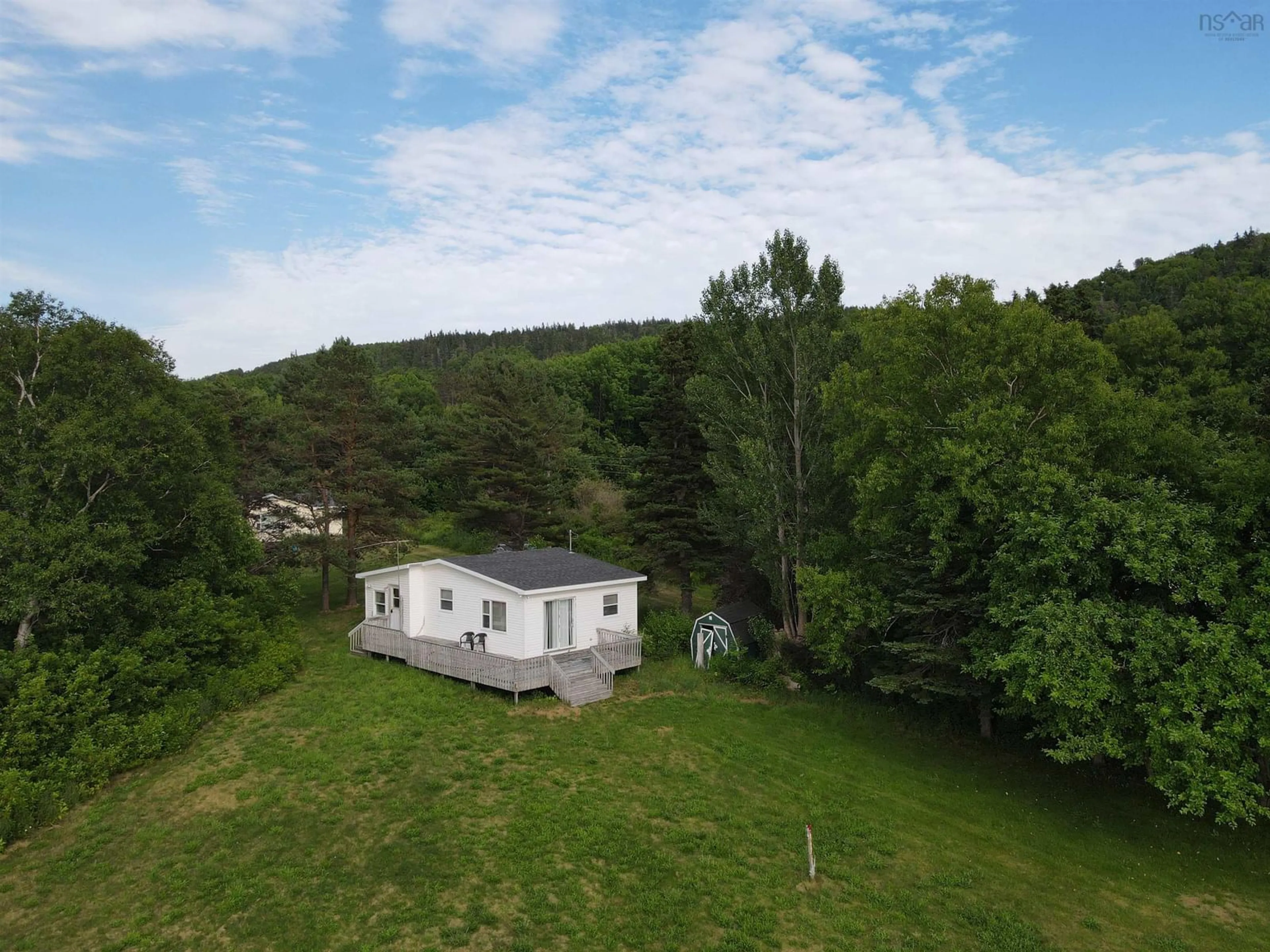 A pic from outside/outdoor area/front of a property/back of a property/a pic from drone, unknown for 8356 East Bay Hwy, Big Pond Nova Scotia B1J 1Z6