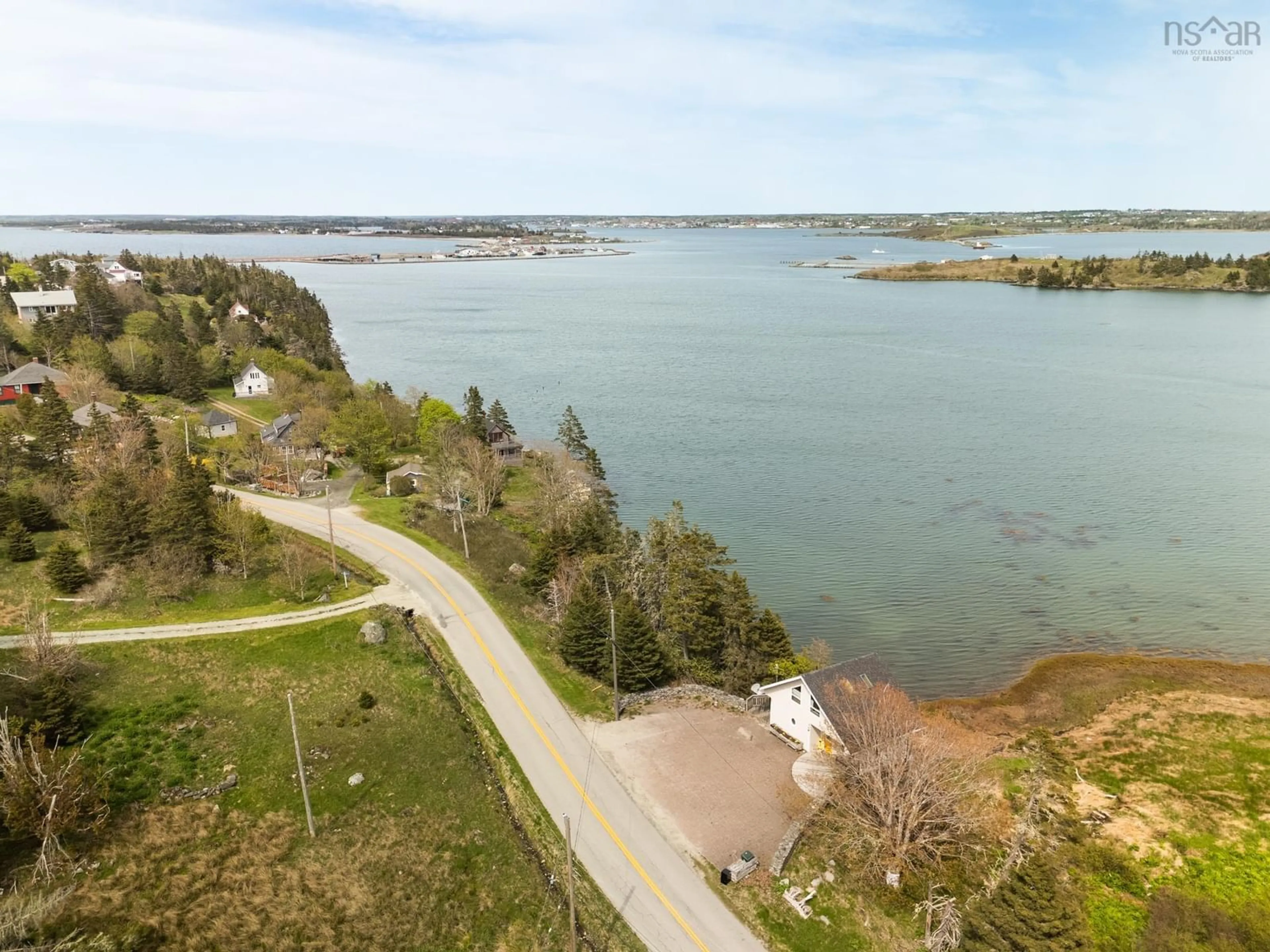 A pic from outside/outdoor area/front of a property/back of a property/a pic from drone, water/lake/river/ocean view for 1501 Highway 304, Cape Forchu Nova Scotia B5A 5G7