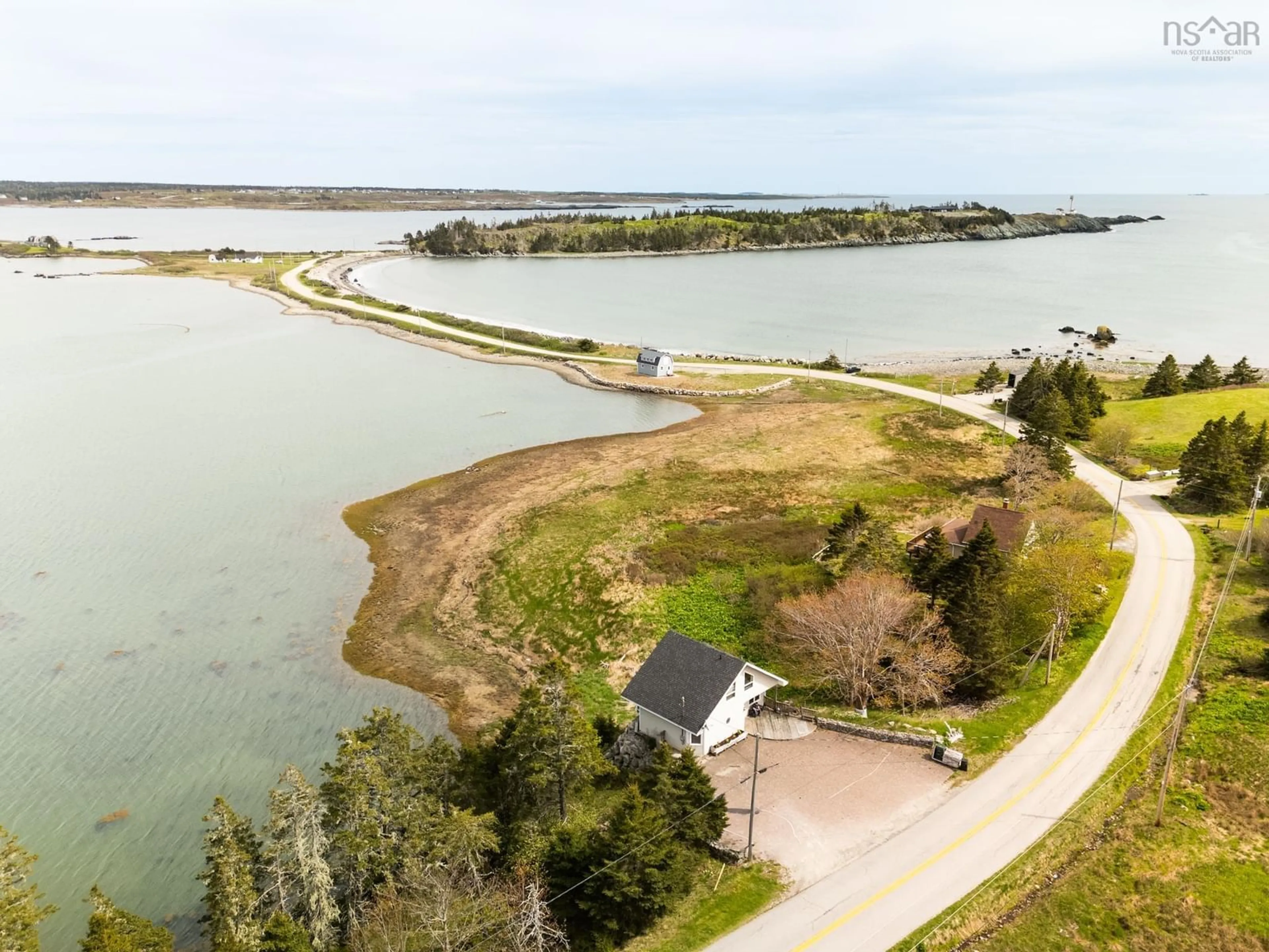 A pic from outside/outdoor area/front of a property/back of a property/a pic from drone, water/lake/river/ocean view for 1501 Highway 304, Cape Forchu Nova Scotia B5A 5G7