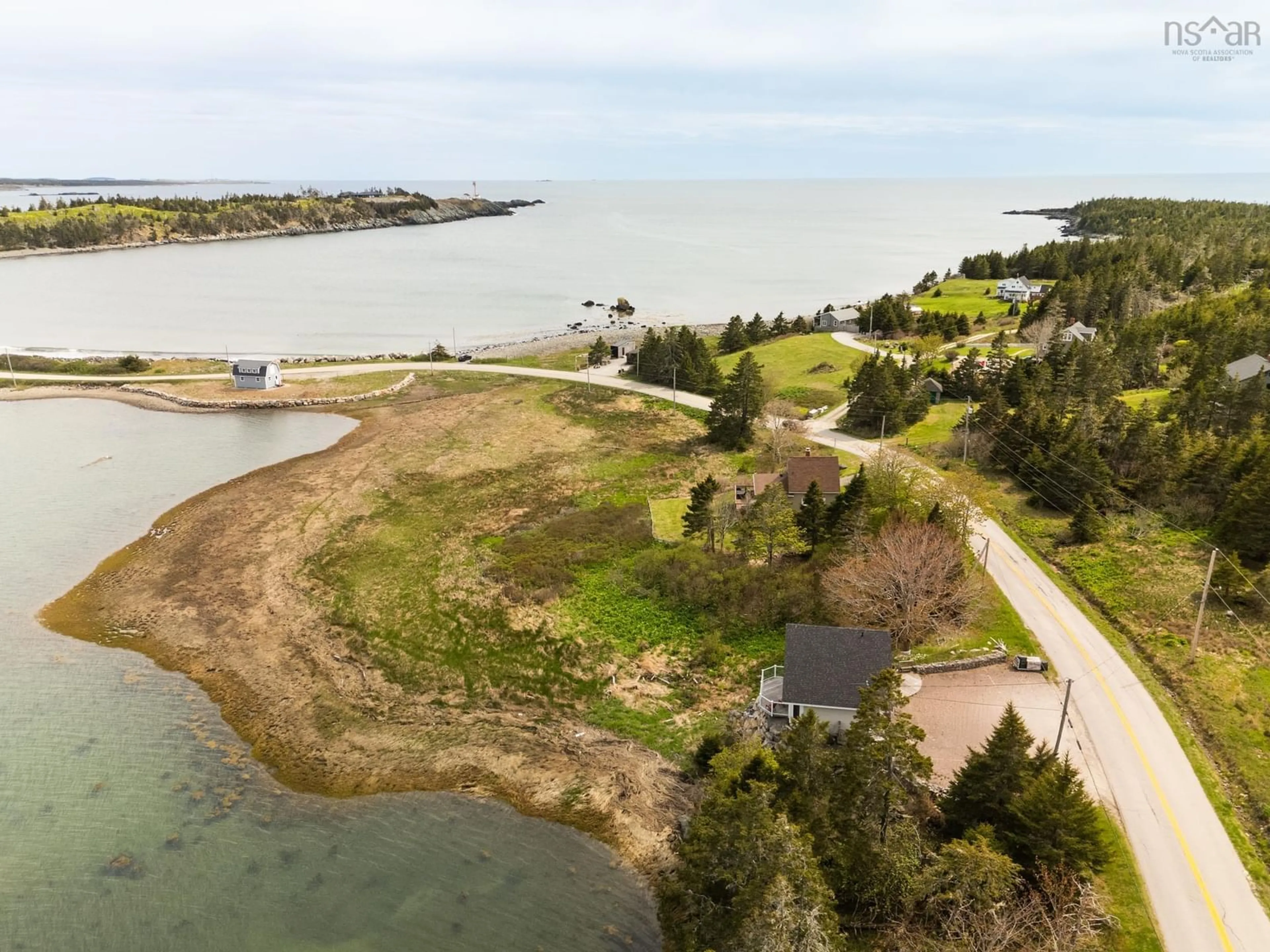A pic from outside/outdoor area/front of a property/back of a property/a pic from drone, water/lake/river/ocean view for 1501 Highway 304, Cape Forchu Nova Scotia B5A 5G7