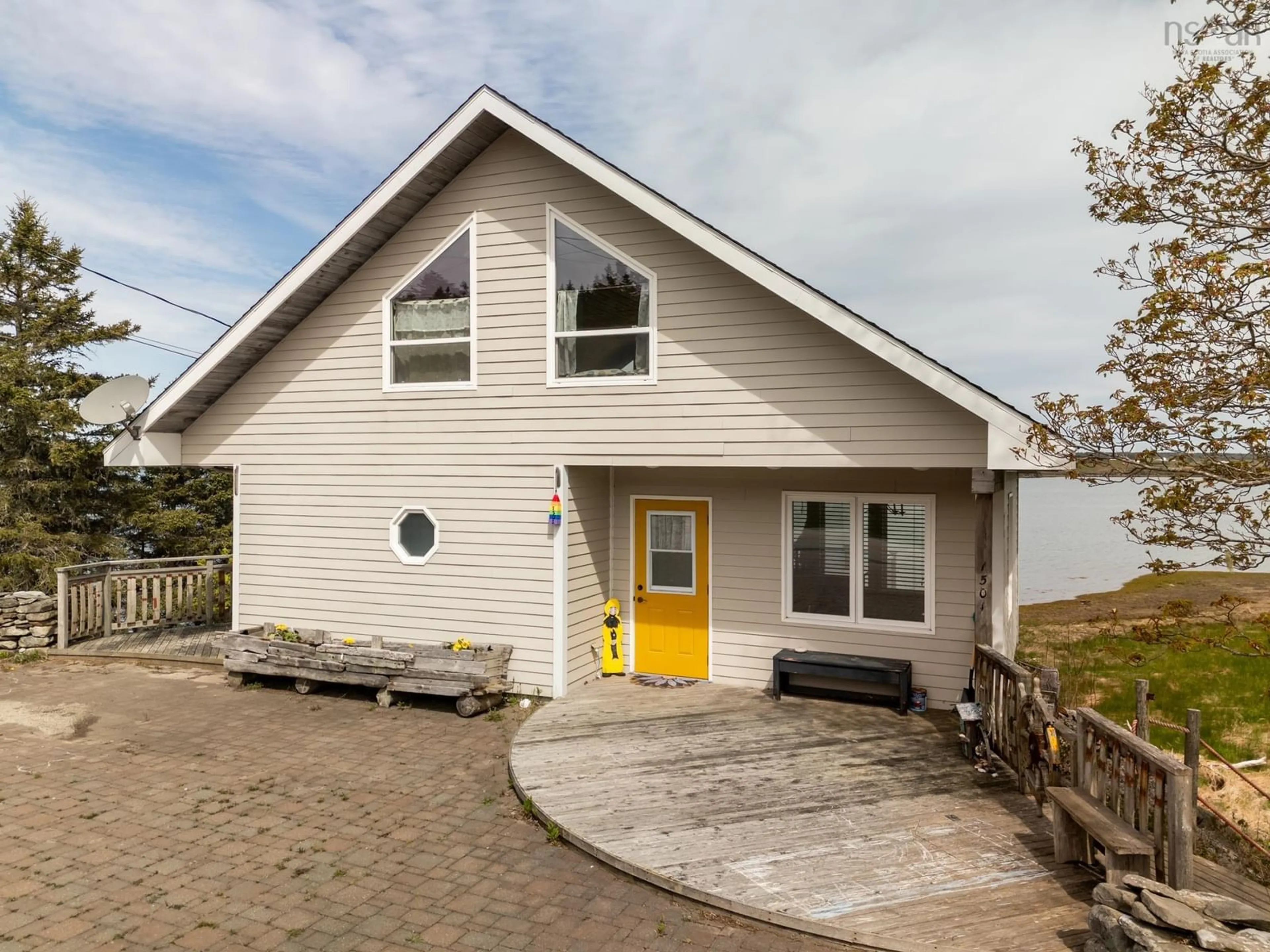 Home with vinyl exterior material, street for 1501 Highway 304, Cape Forchu Nova Scotia B5A 5G7