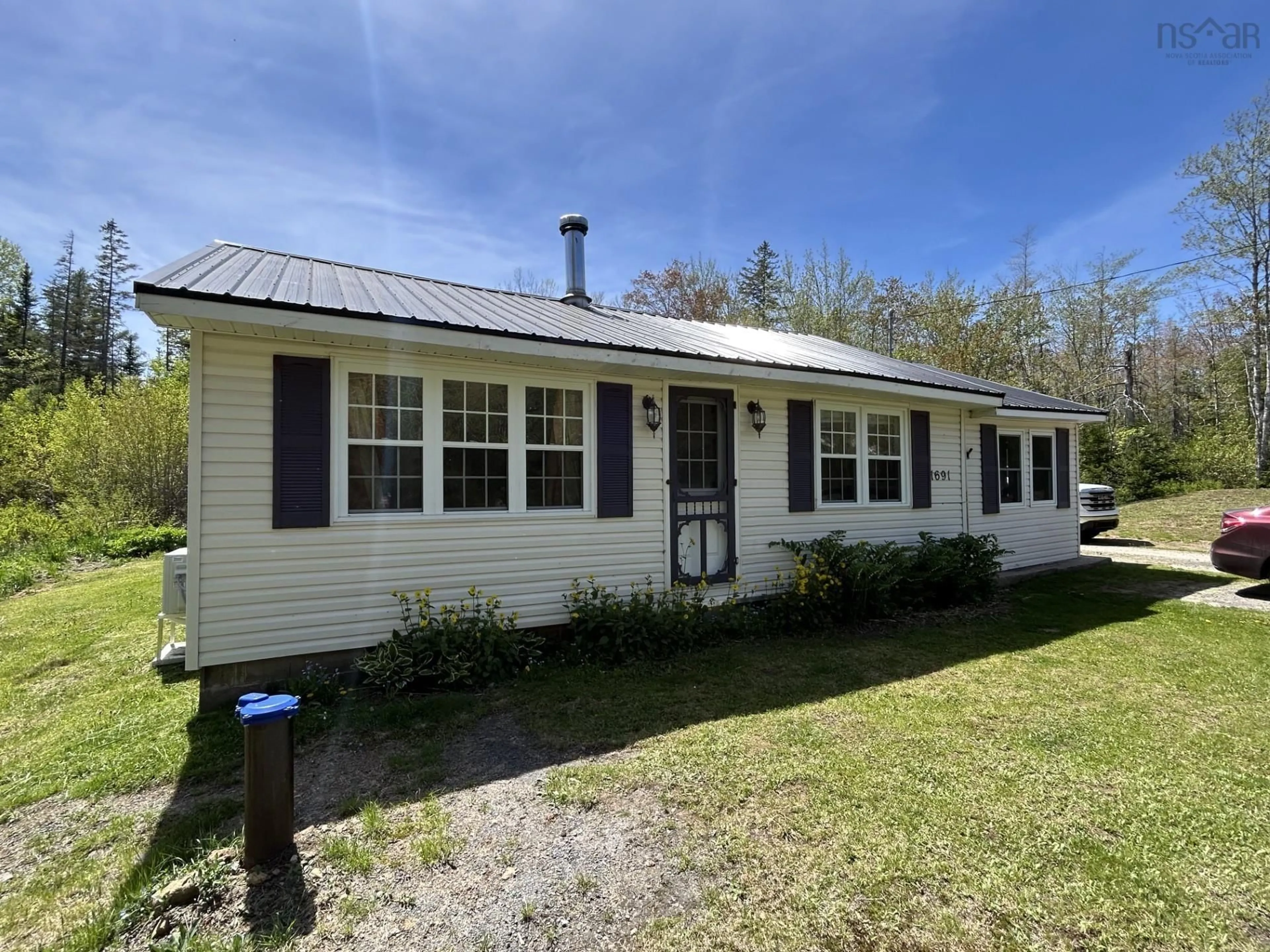 Home with vinyl exterior material, street for 1691 Greenfield Rd, Greenfield Nova Scotia B0P 1X0